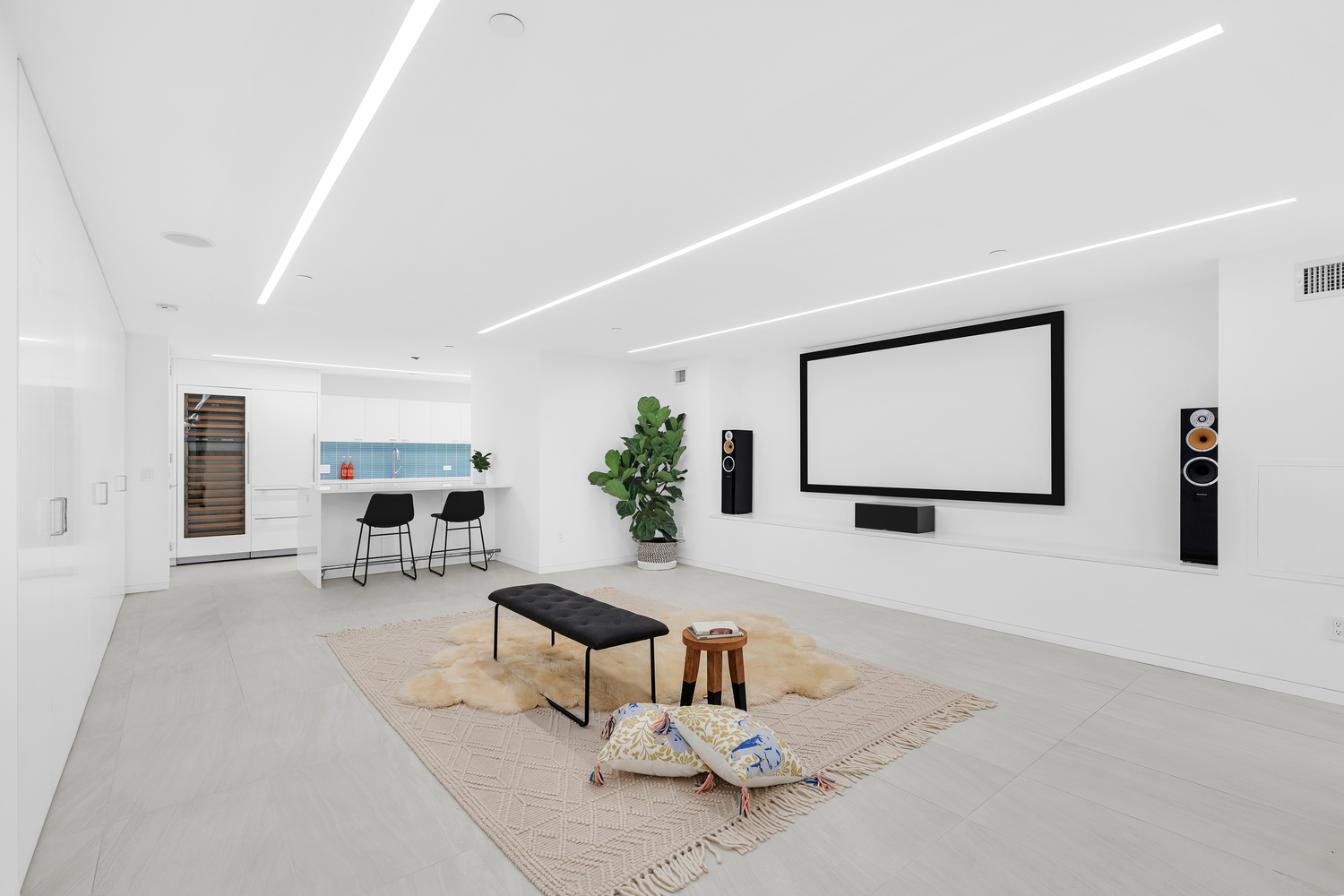 200 Mercer Street, Unit MAIS-G Manhattan, NY 10012 - Photo 13 of 17 a living room with furniture and a flat screen tv