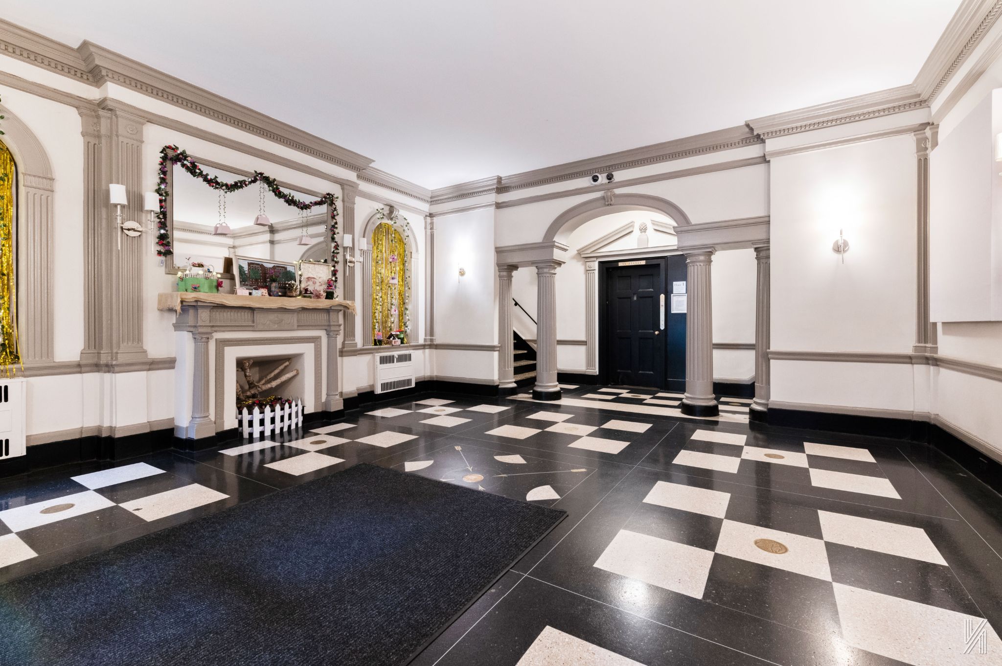 35-06 88th Street, Unit 5E Queens, NY 11372 - Photo 19 of 21 a living room with furniture and a fireplace