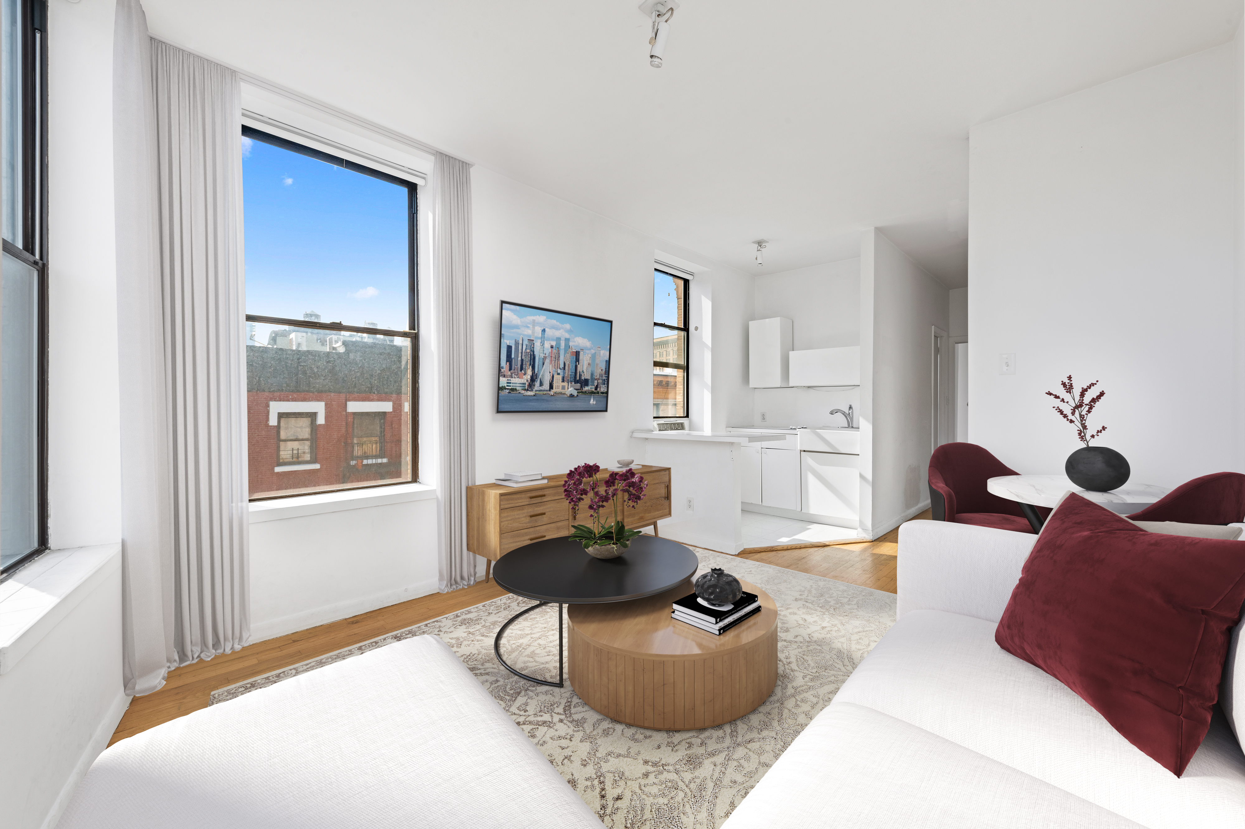 214 Mulberry Street, Unit 6B Manhattan, NY 10012 - Photo 3 of 12 a living room with furniture flowerpot and window