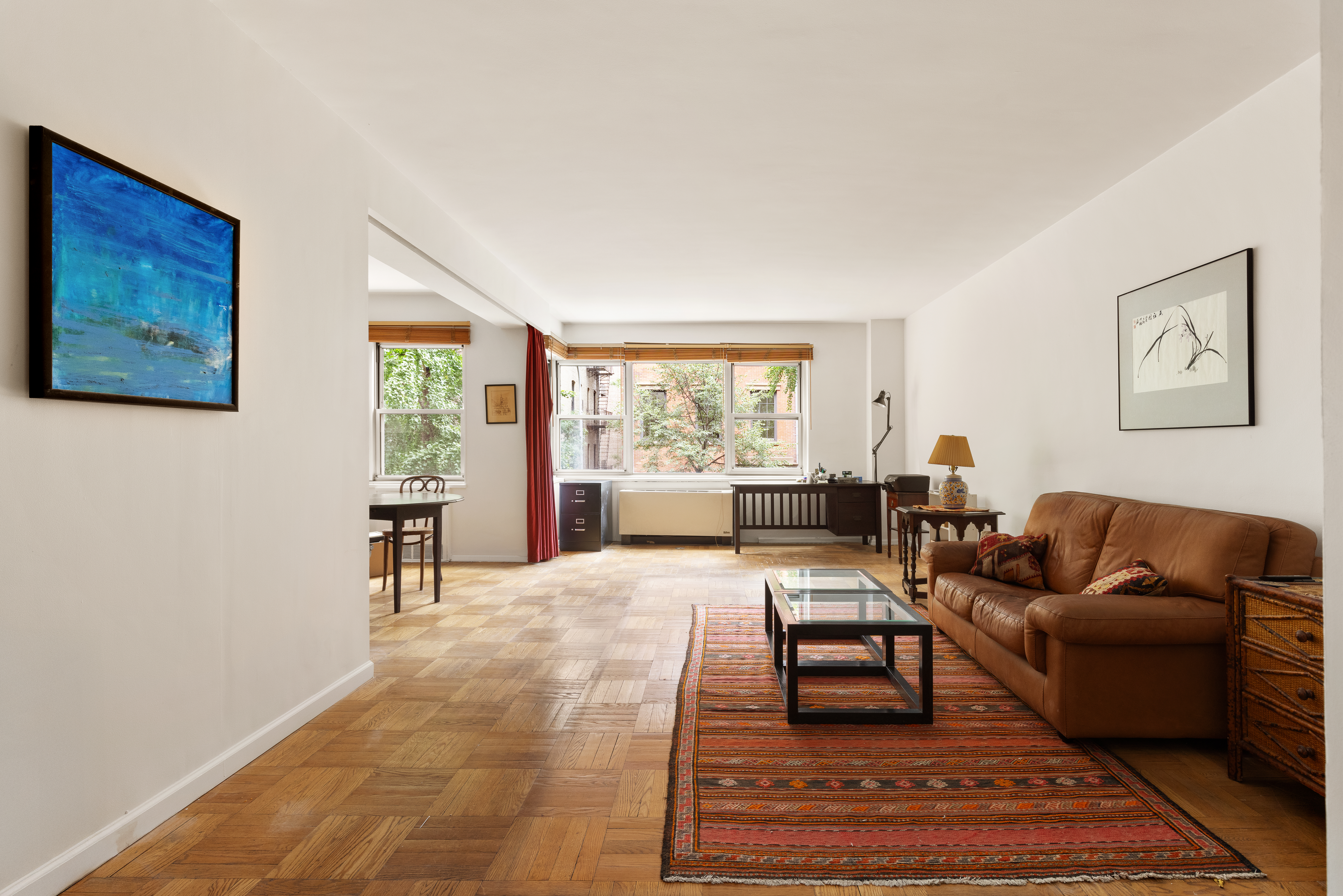 11 5th Avenue, Unit 3R Manhattan, NY 10003 - Photo 2 of 12 a living room with furniture and a window