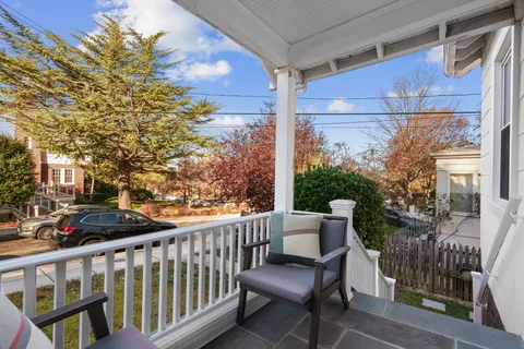 a view of a porch with furniture