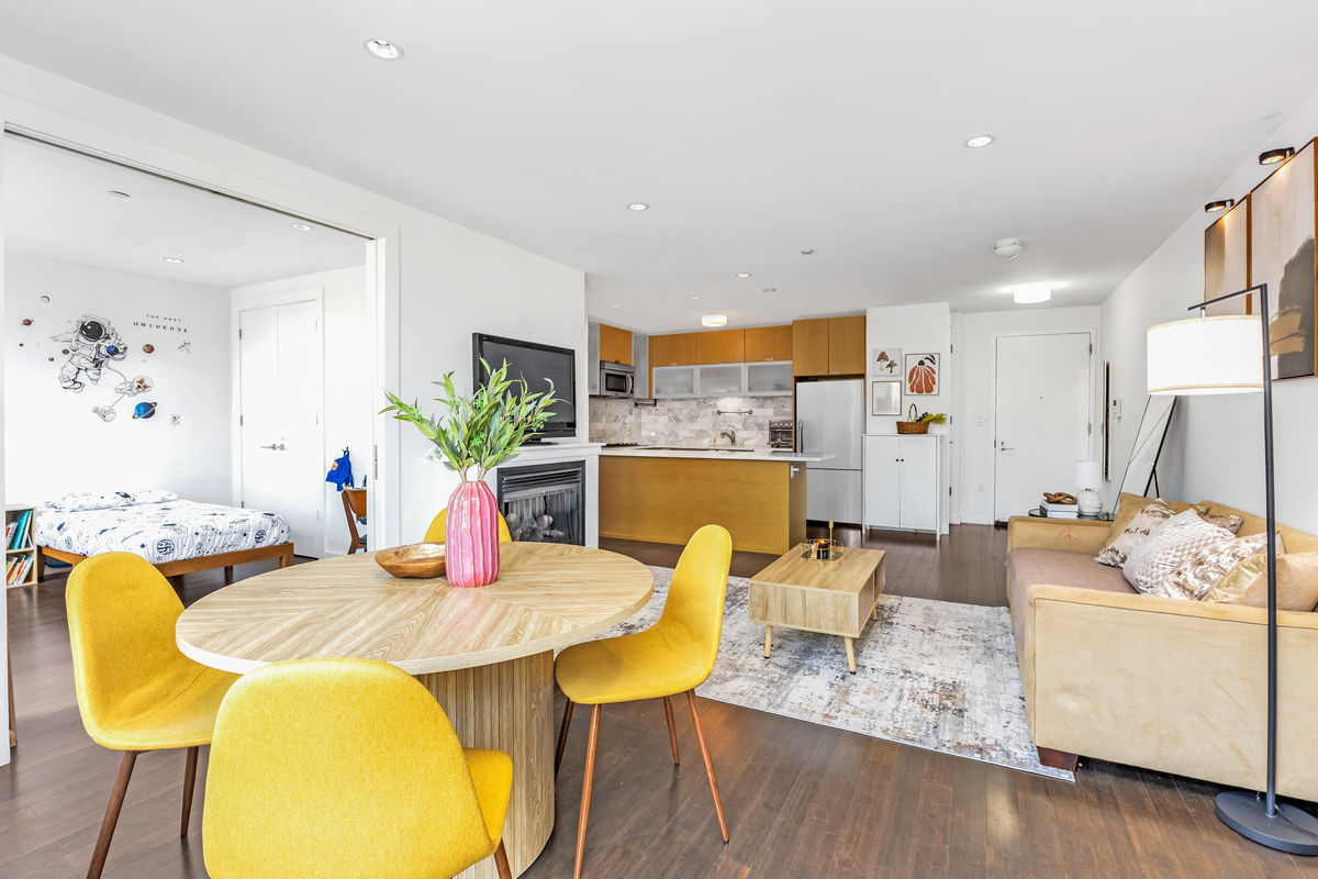 10-40 46th Road, Unit 3D Queens, NY 11101 - Photo 2 of 10 a view of a dining room with furniture and wooden floor