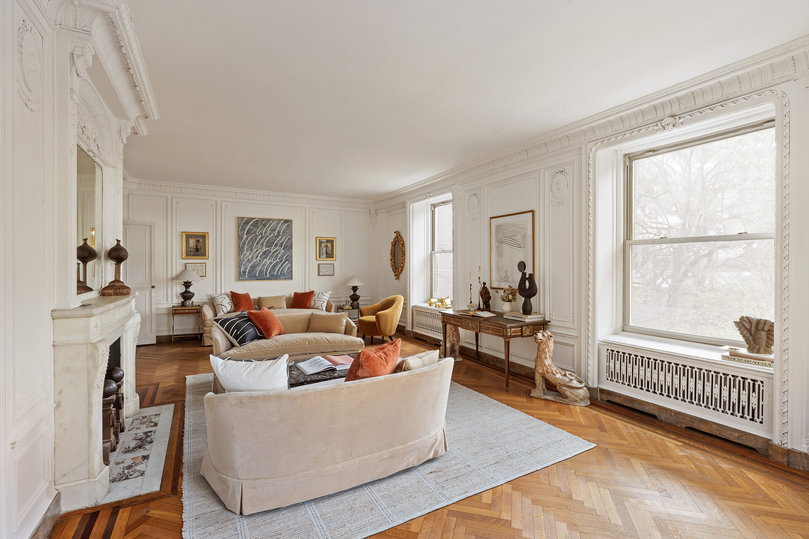 1136 5th Avenue, Unit 6A Manhattan, NY 10128 - Photo 10 of 44 a living room with fireplace furniture and a window