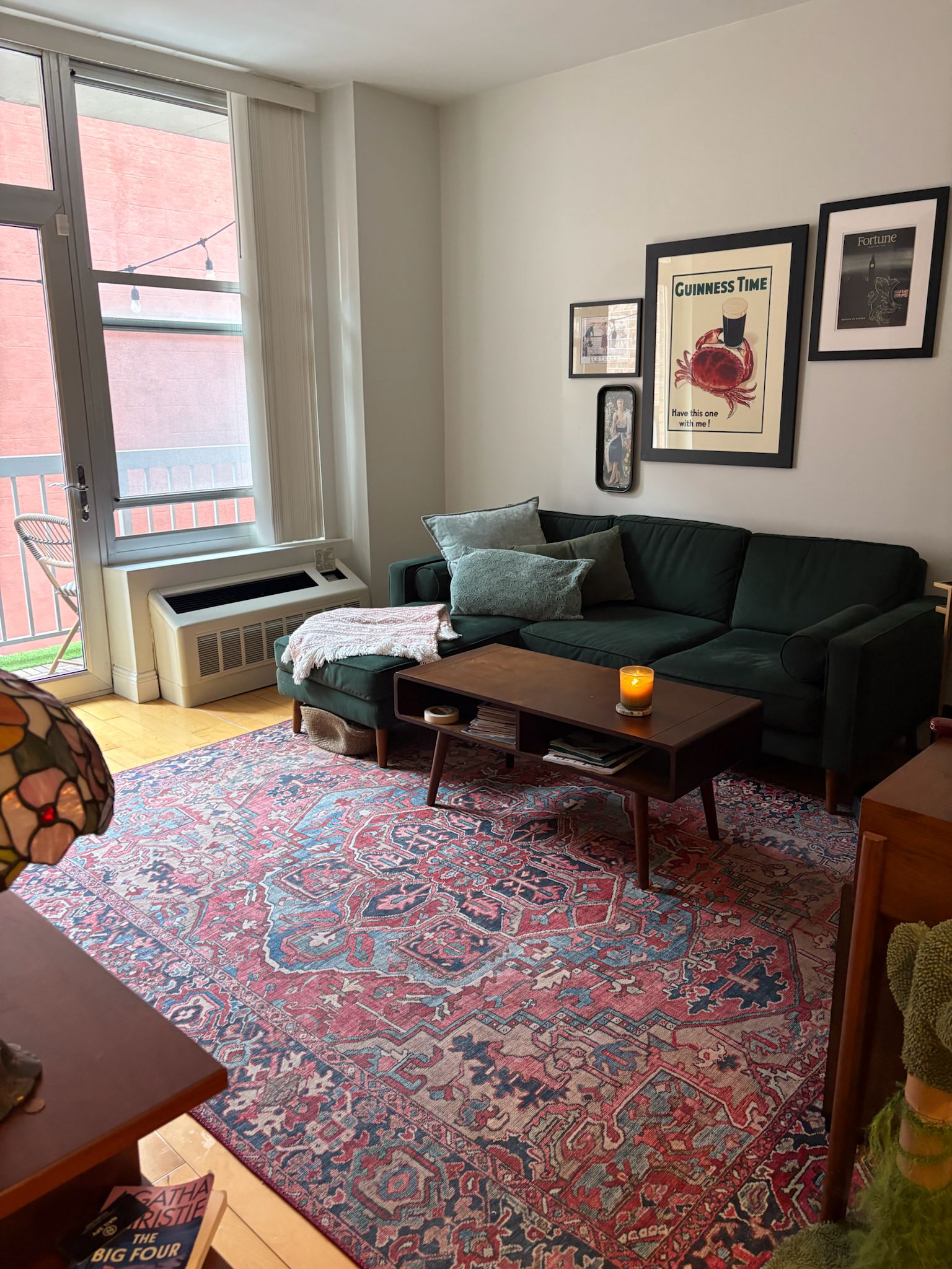 249 East 118th Street, Unit 3A Manhattan, NY 10035 - Photo 3 of 16 a living room with furniture and a window
