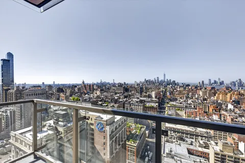 a view of a city from a balcony