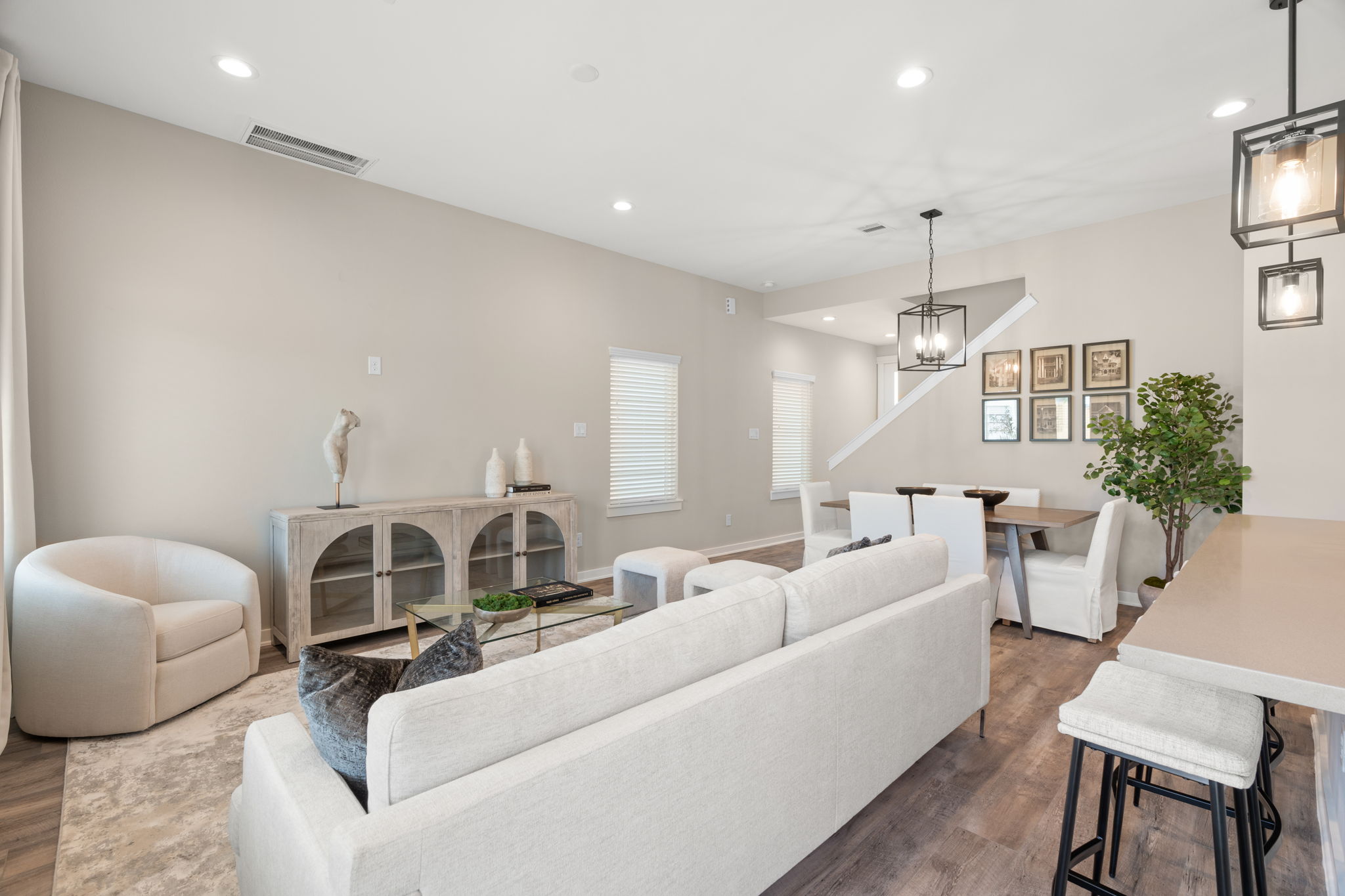 11303 Stonework Grv Lane Houston, TX 77076 - Photo 6 of 39 a living room with furniture and a chandelier