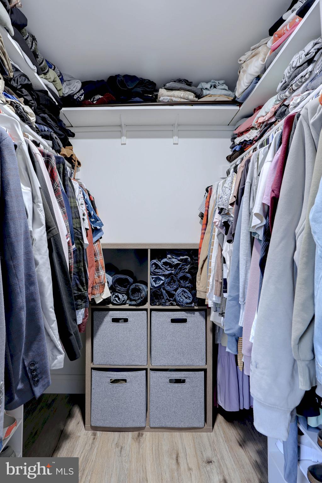 6257 Fairbourne Court Hanover, MD 21076 - Photo 24 of 47 a view of walk in closet with clothes and shoes