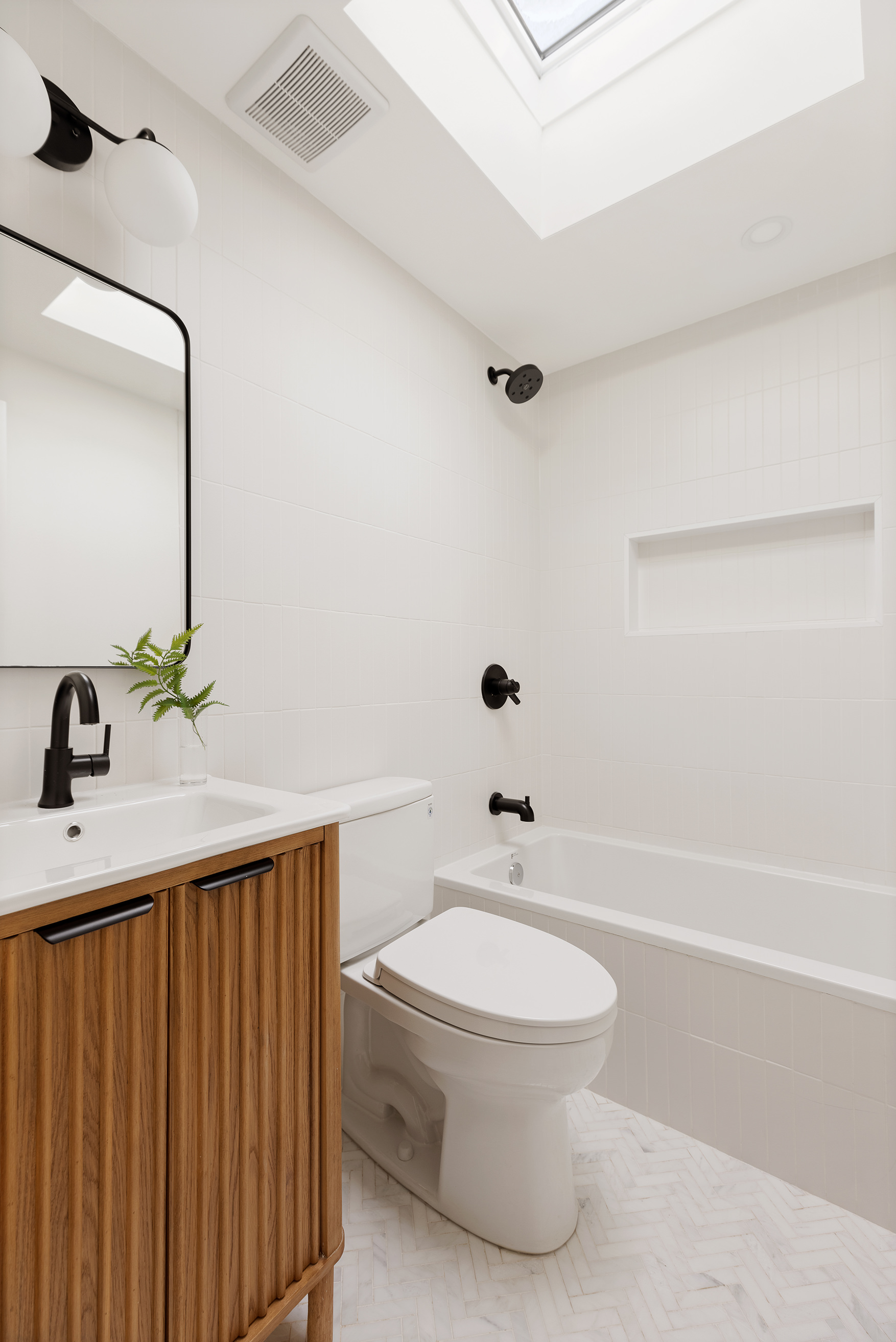 15 Verona Place Brooklyn, NY 11216 - Photo 12 of 14 a bathroom with a sink a toilet and shower