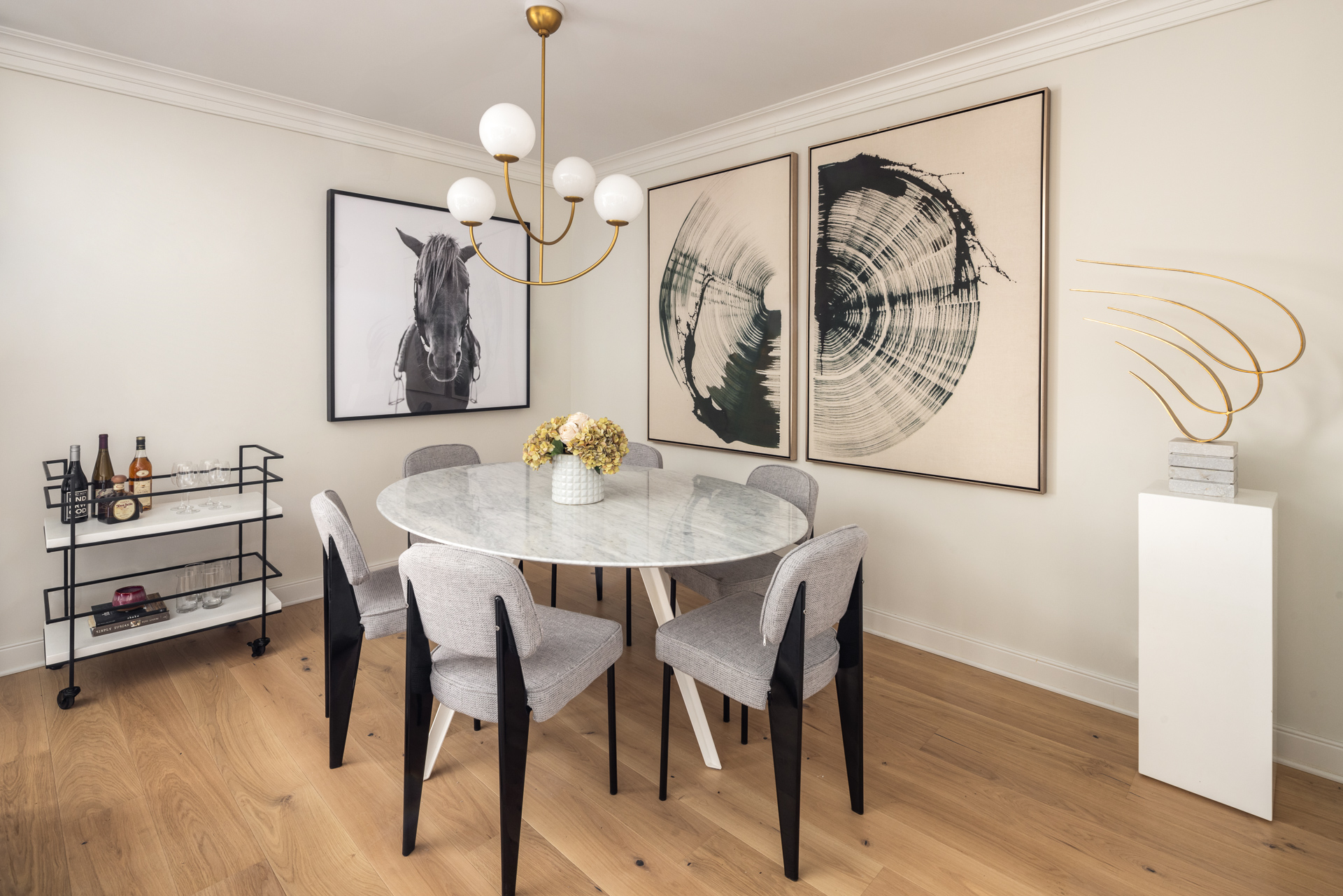 32 East 76th Street, Unit 805 Manhattan, NY 10021 - Photo 10 of 15 a view of a dining room with furniture and wooden floor