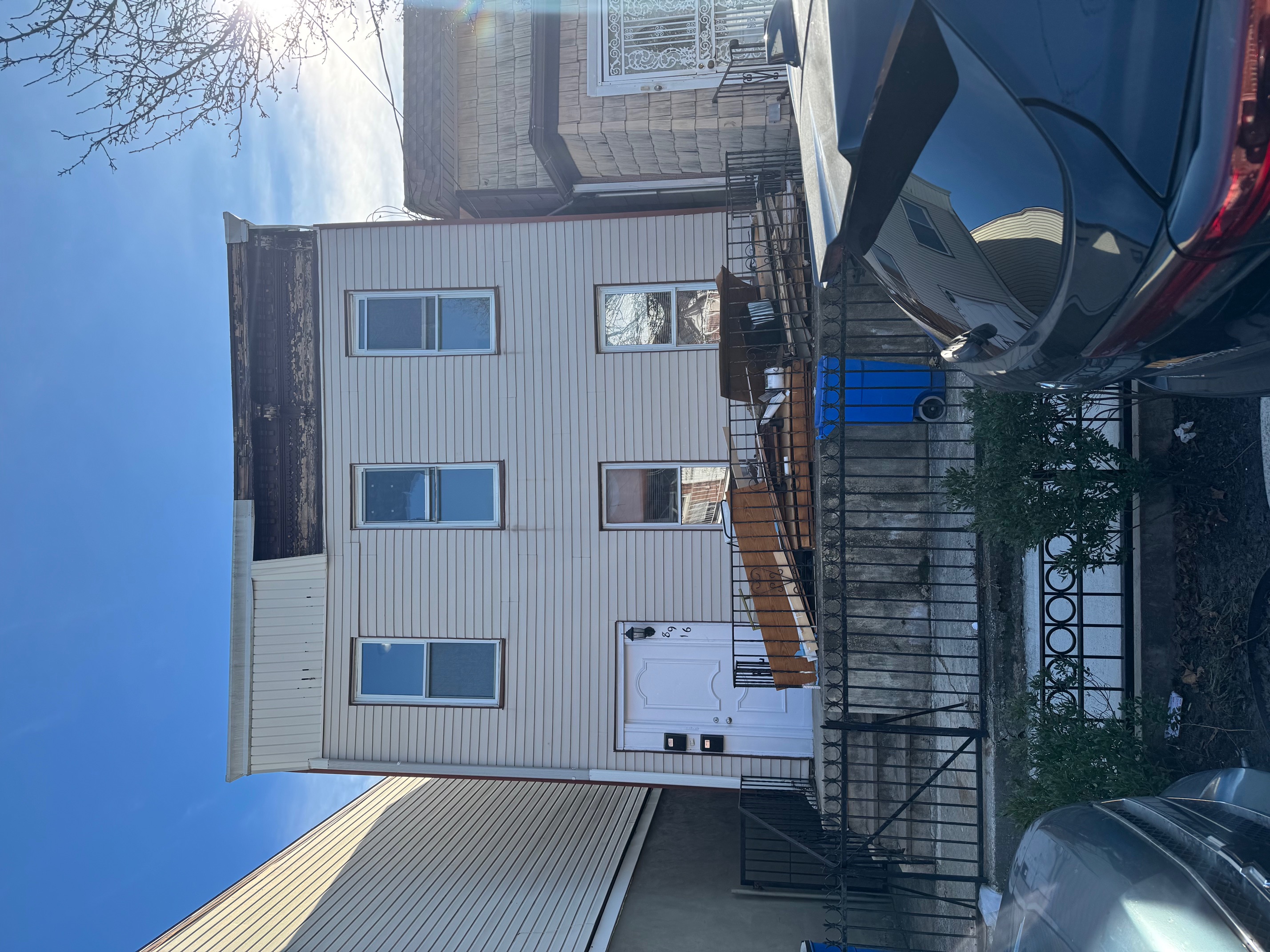 89-16 102nd Road, Unit 2 Queens, NY 11416 - Photo 12 of 13 a view of house with outdoor seating