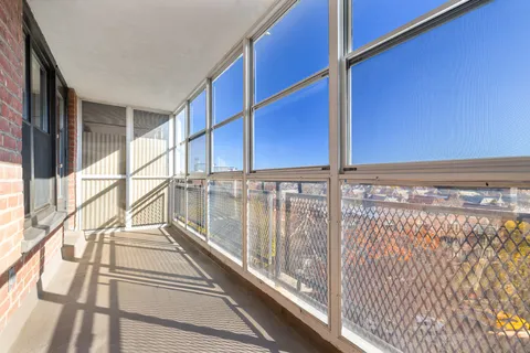 a view of a balcony with city view