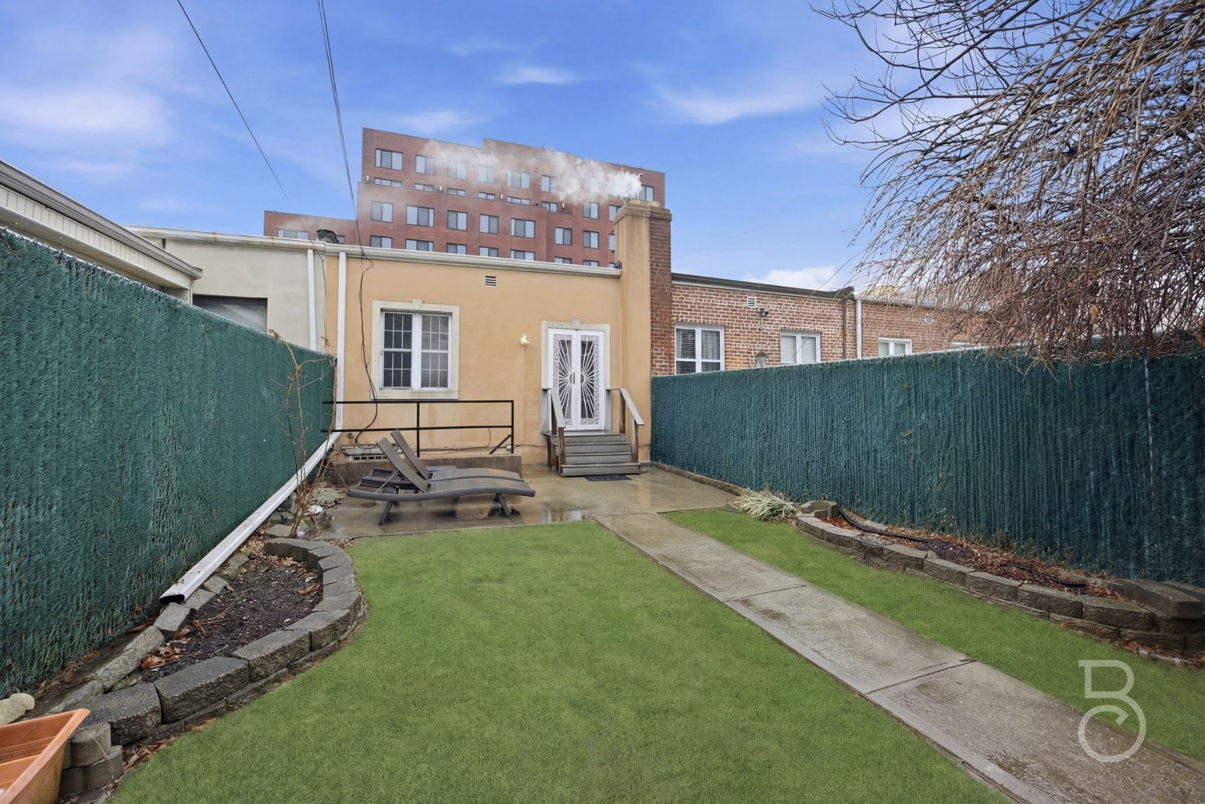22-61 46th Street Queens, NY 11105 - Photo 16 of 24 a view of a house with a backyard