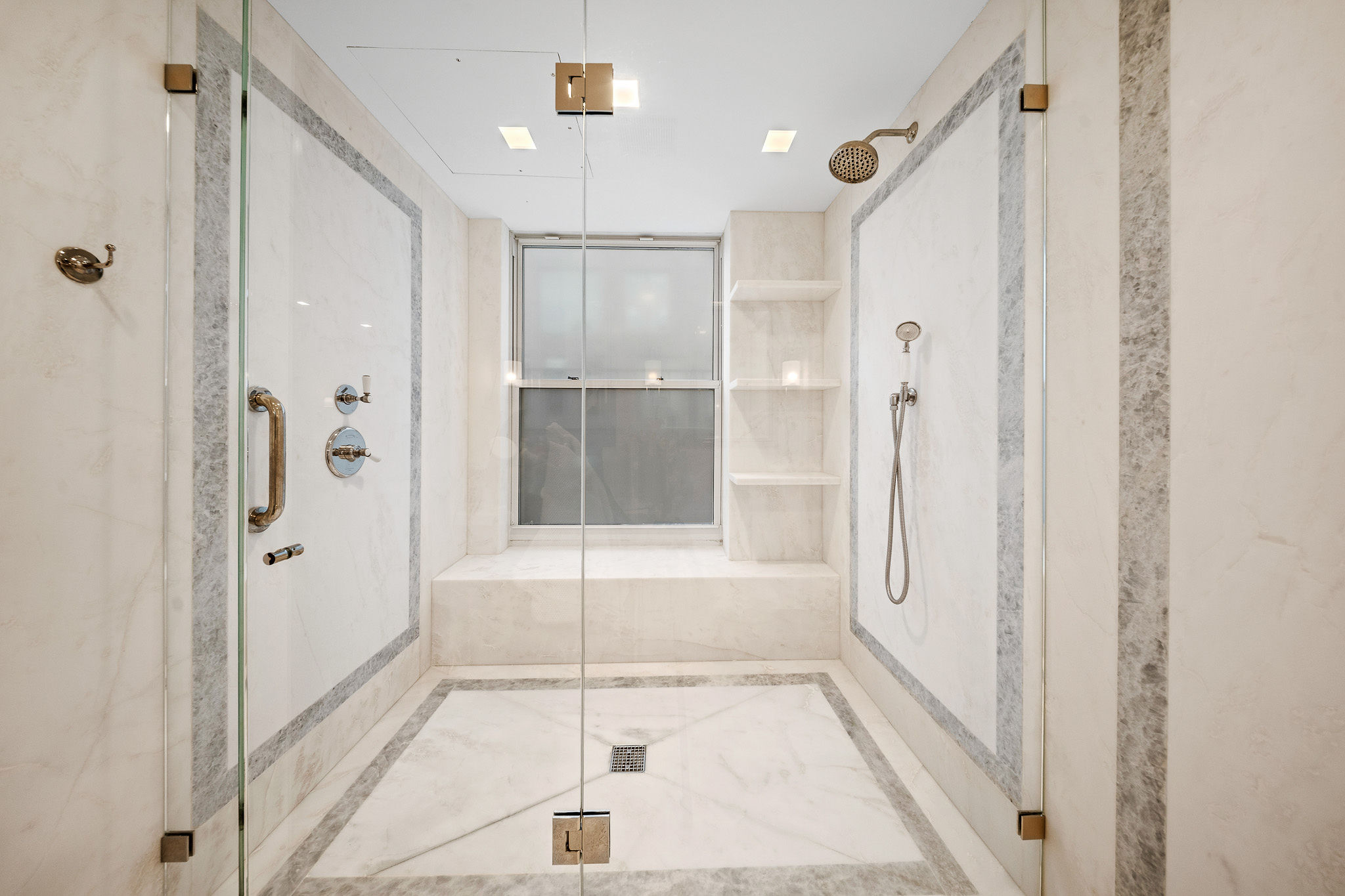45 Crosby Street, Unit 6 North Manhattan, NY 10012 - Photo 12 of 17 a bathroom with a glass shower door