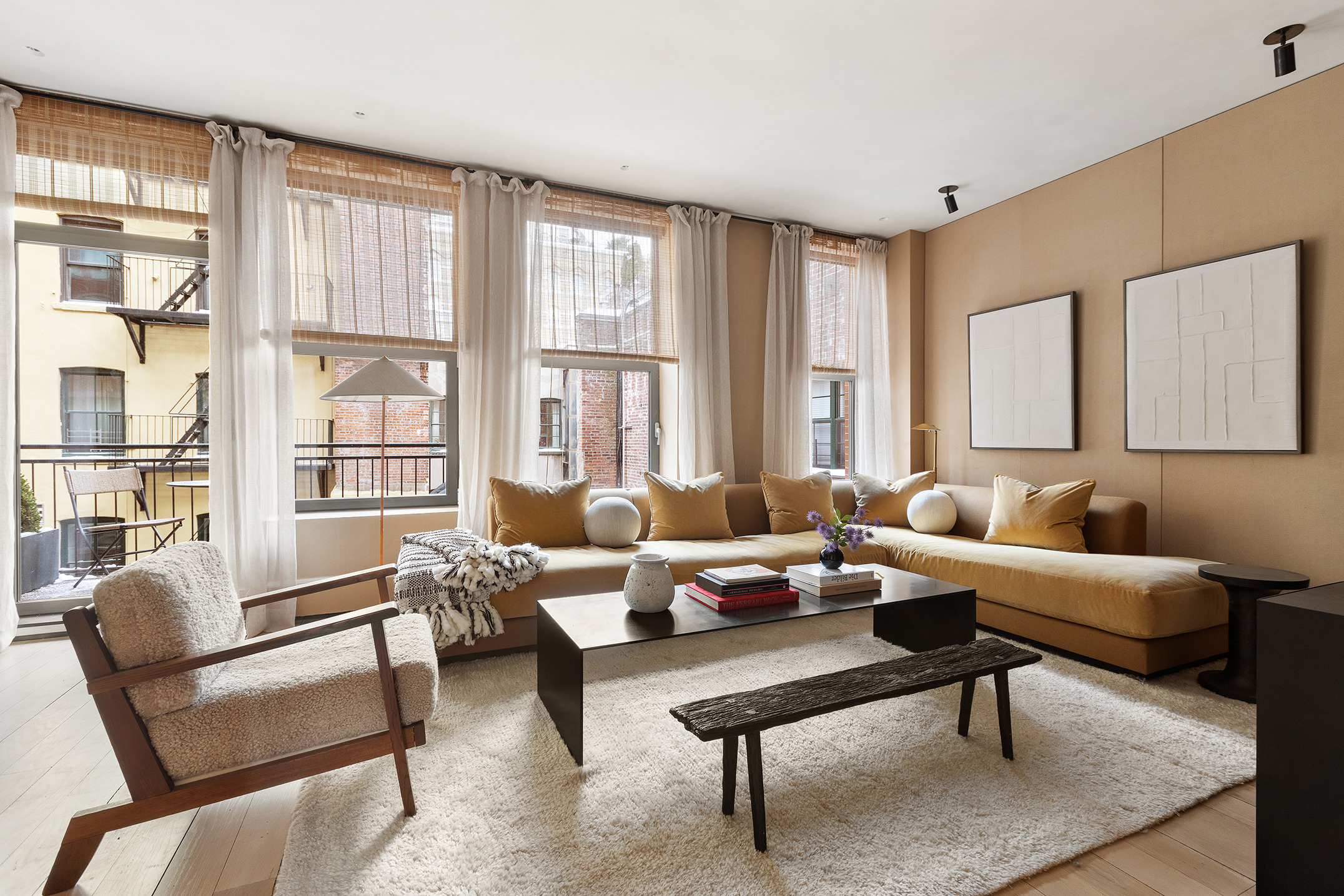 415 Washington Street, Unit 5A Manhattan, NY 10013 - Photo 17 of 21 a living room with furniture and a large window