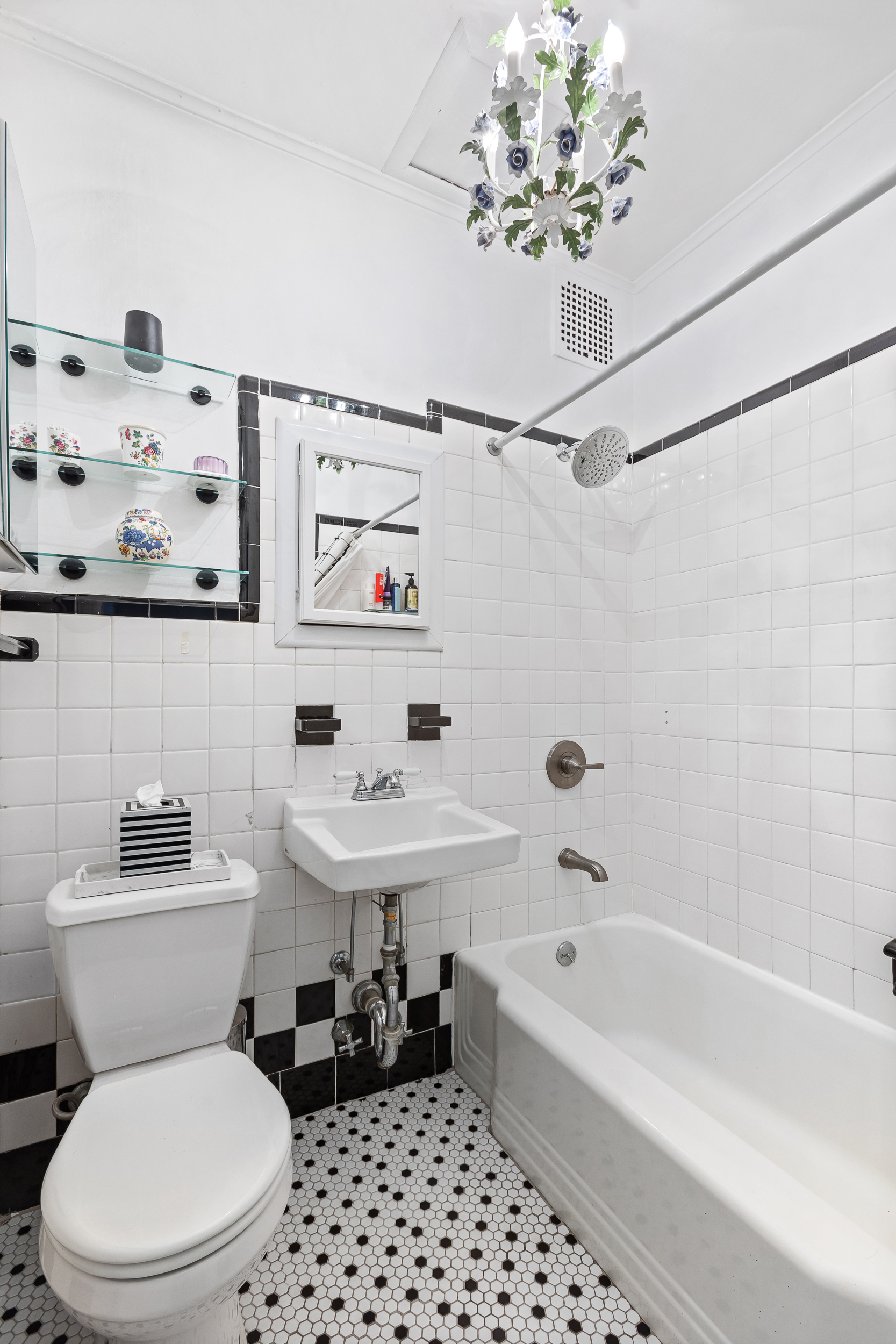 227 Garfield Place, Unit Garden Duplex Brooklyn, NY 11215 - Photo 7 of 15 a bathroom with a sink a toilet and a bathtub