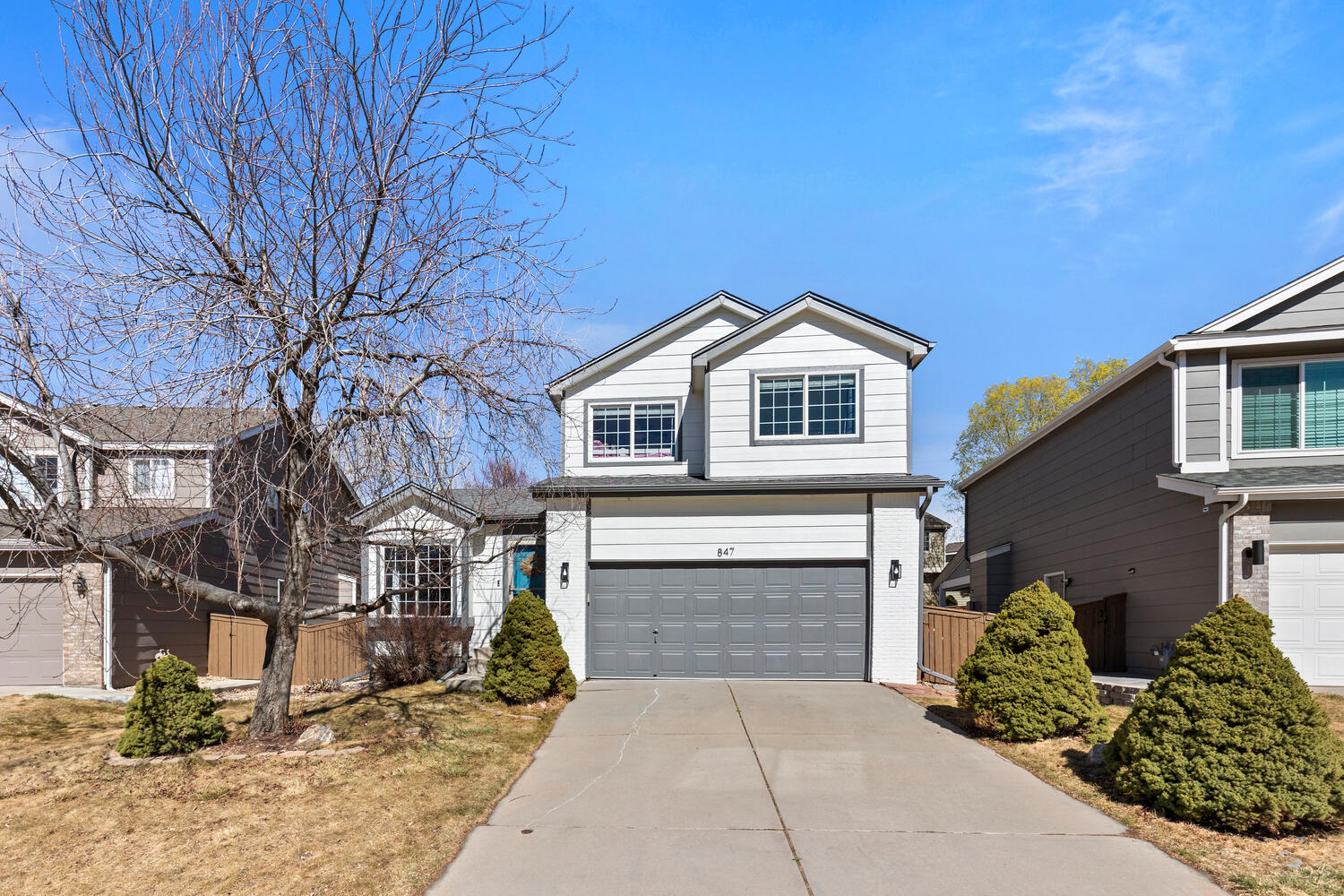847 Timbervale Trail Highlands Ranch, CO 80129 - Photo 2 of 36 a front view of a house with yard