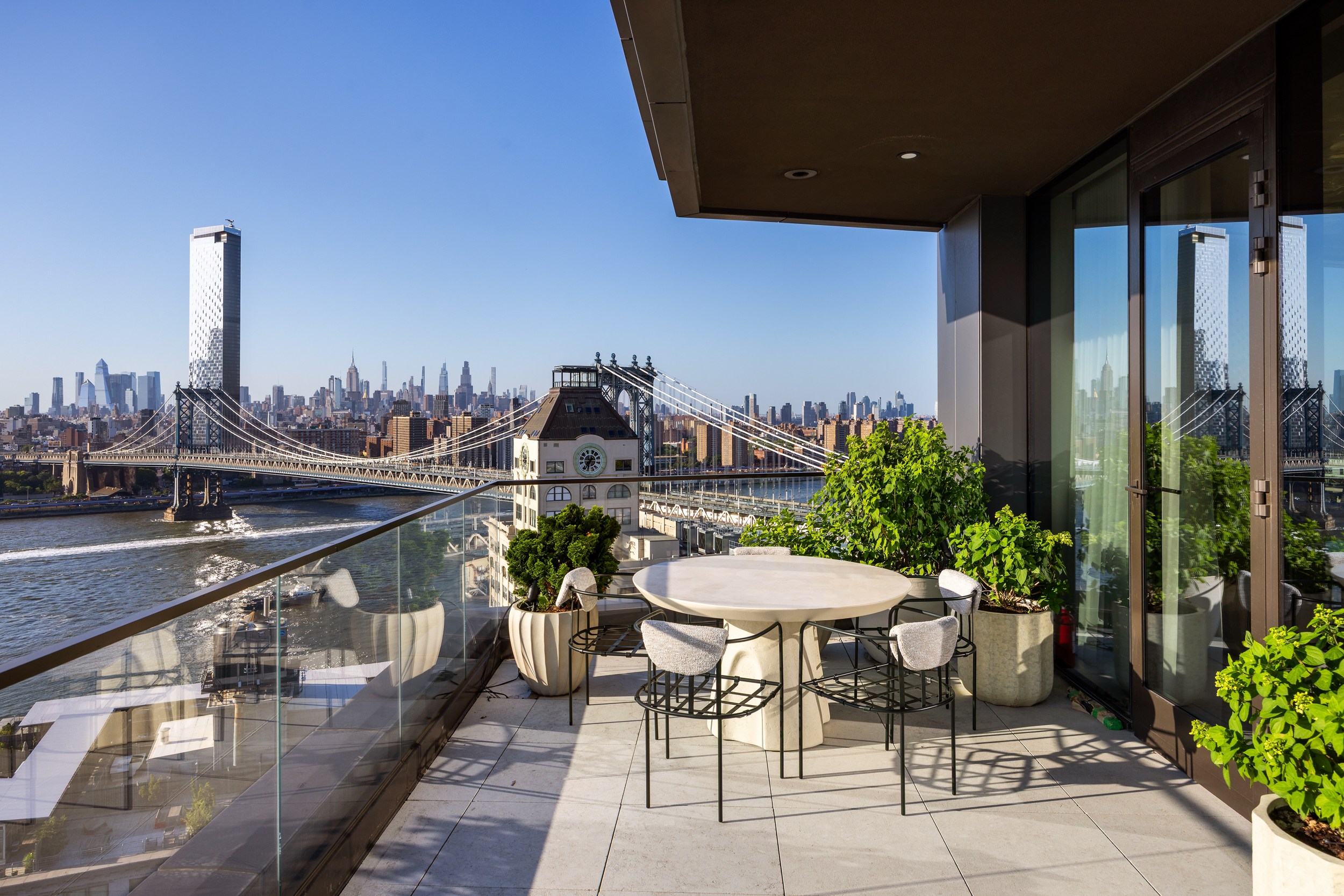30 Front Street, Unit 25A Brooklyn, NY 11201 - Photo 6 of 45 a balcony with chairs and table