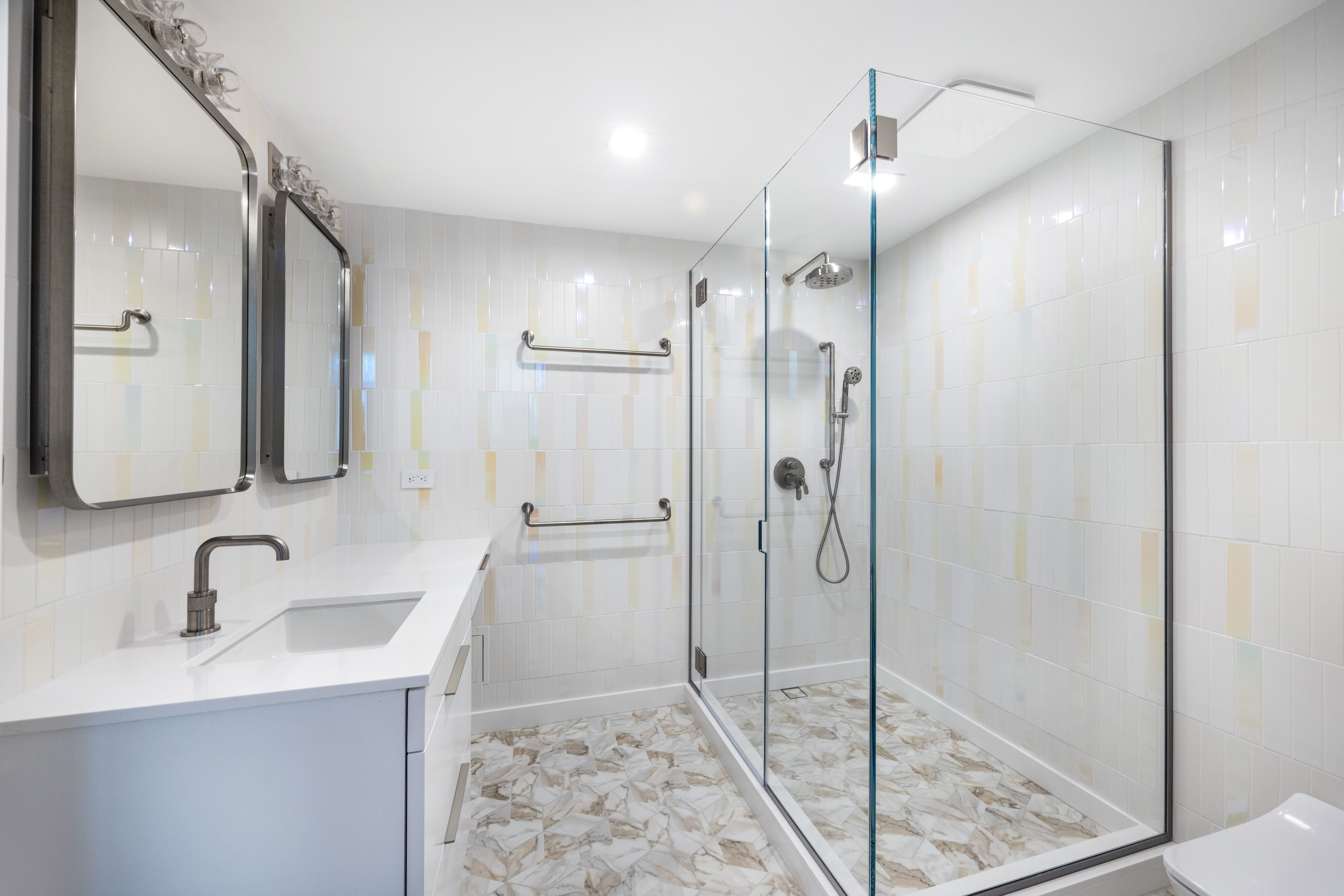 340 Albany Street Manhattan, NY 10280 - Photo 15 of 24 a bathroom with a sink and a mirror