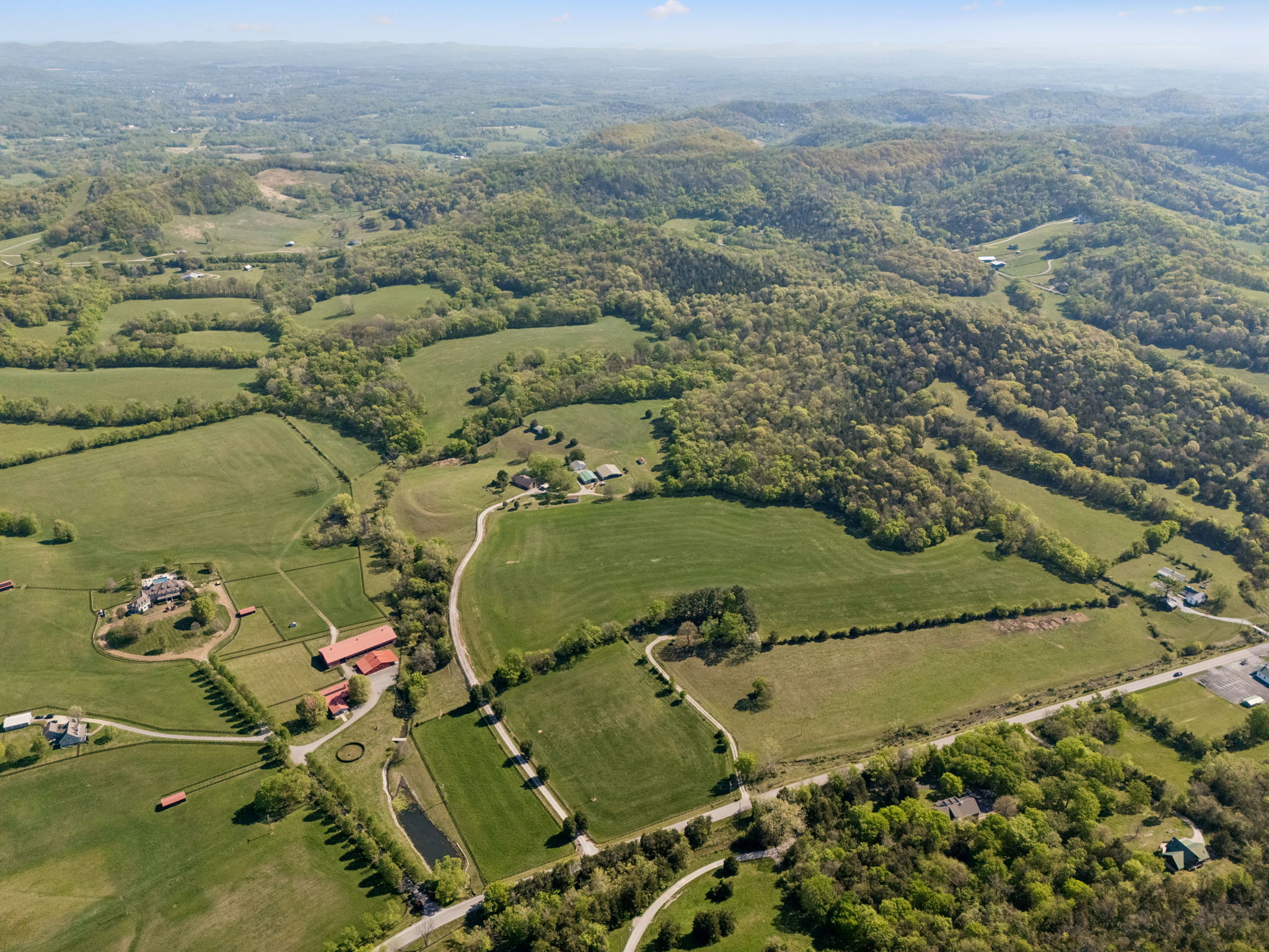 Undisclosed Address College Grove, TN 37046 - Photo 4 of 24 an aerial view of a house with a yard