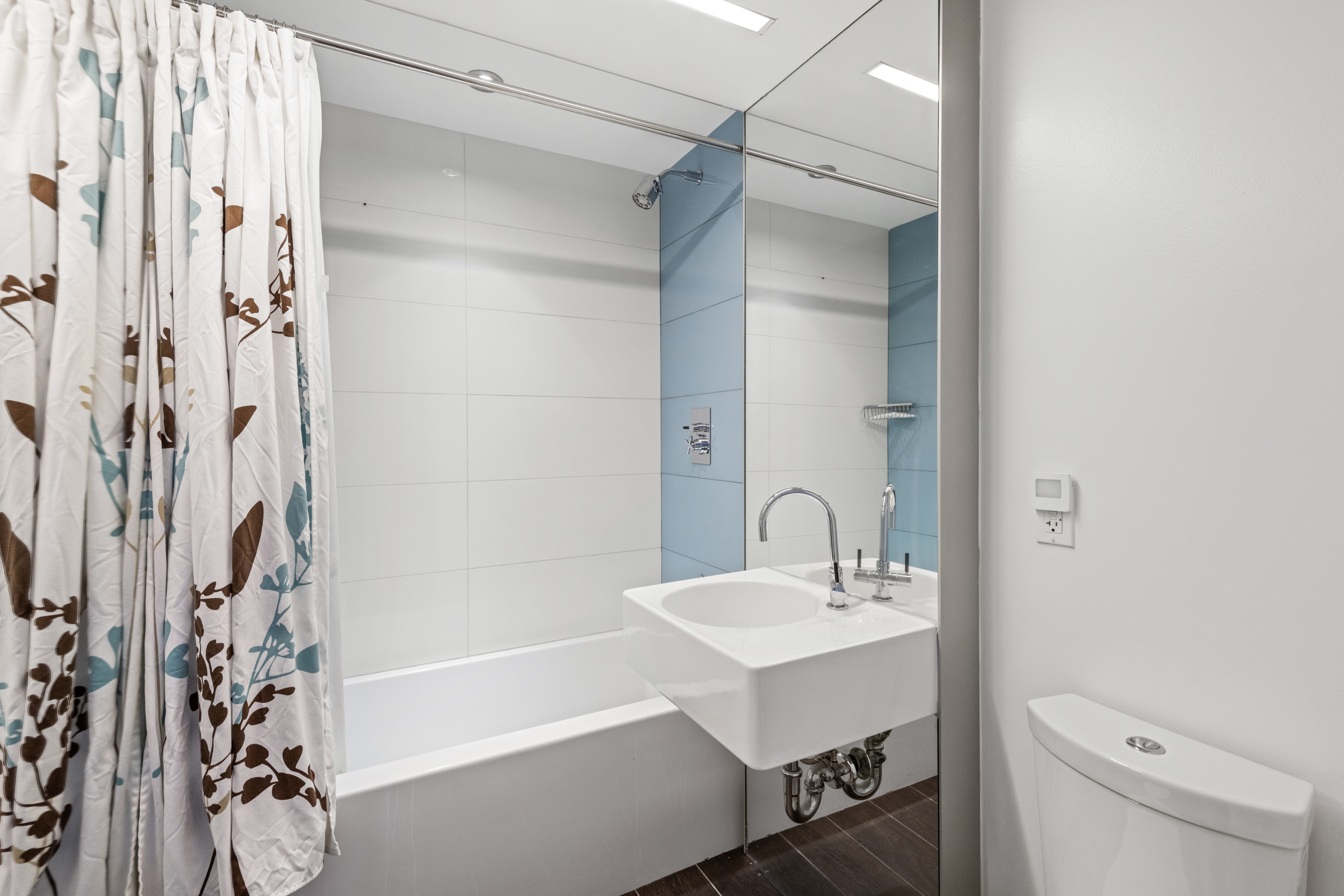 Brooklyn, NY 11249 - Photo 12 of 21 a bathroom with a sink toilet and shower