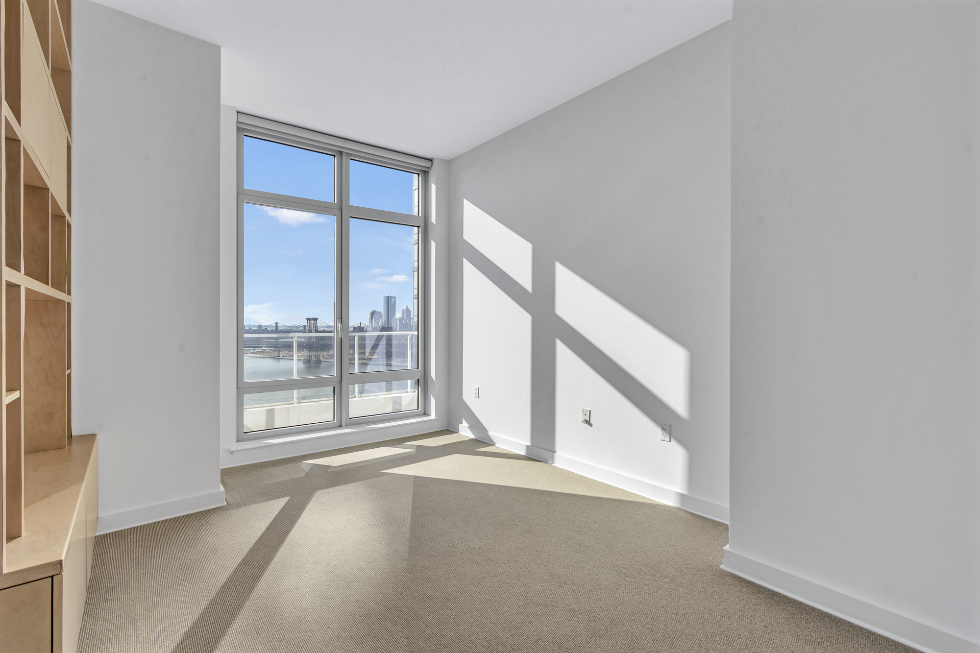 2 Northside Piers, Unit PH2 Brooklyn, NY 11249 - Photo 20 of 27 a view of an empty room with a window