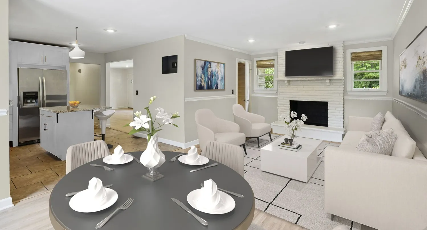 a living room with furniture a fireplace and a flat screen tv