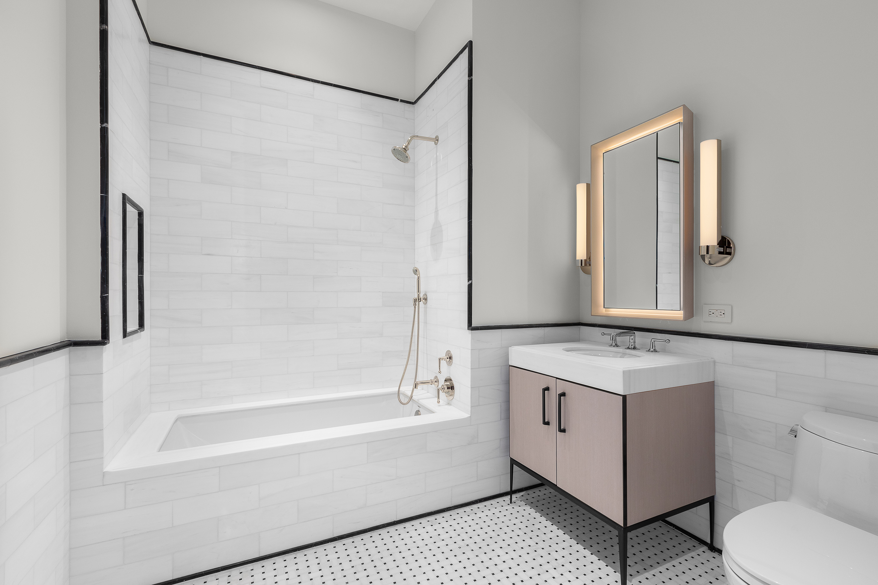 1165 Madison Avenue, Unit 3S Manhattan, NY 10028 - Photo 14 of 25 a bathroom with a granite countertop sink toilet and shower