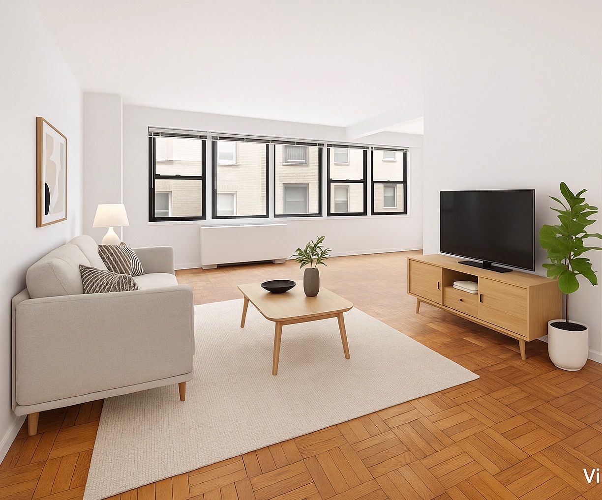220 East 67th Street, Unit 4A Manhattan, NY 10065 - Photo 3 of 7 a living room with furniture and a flat screen tv