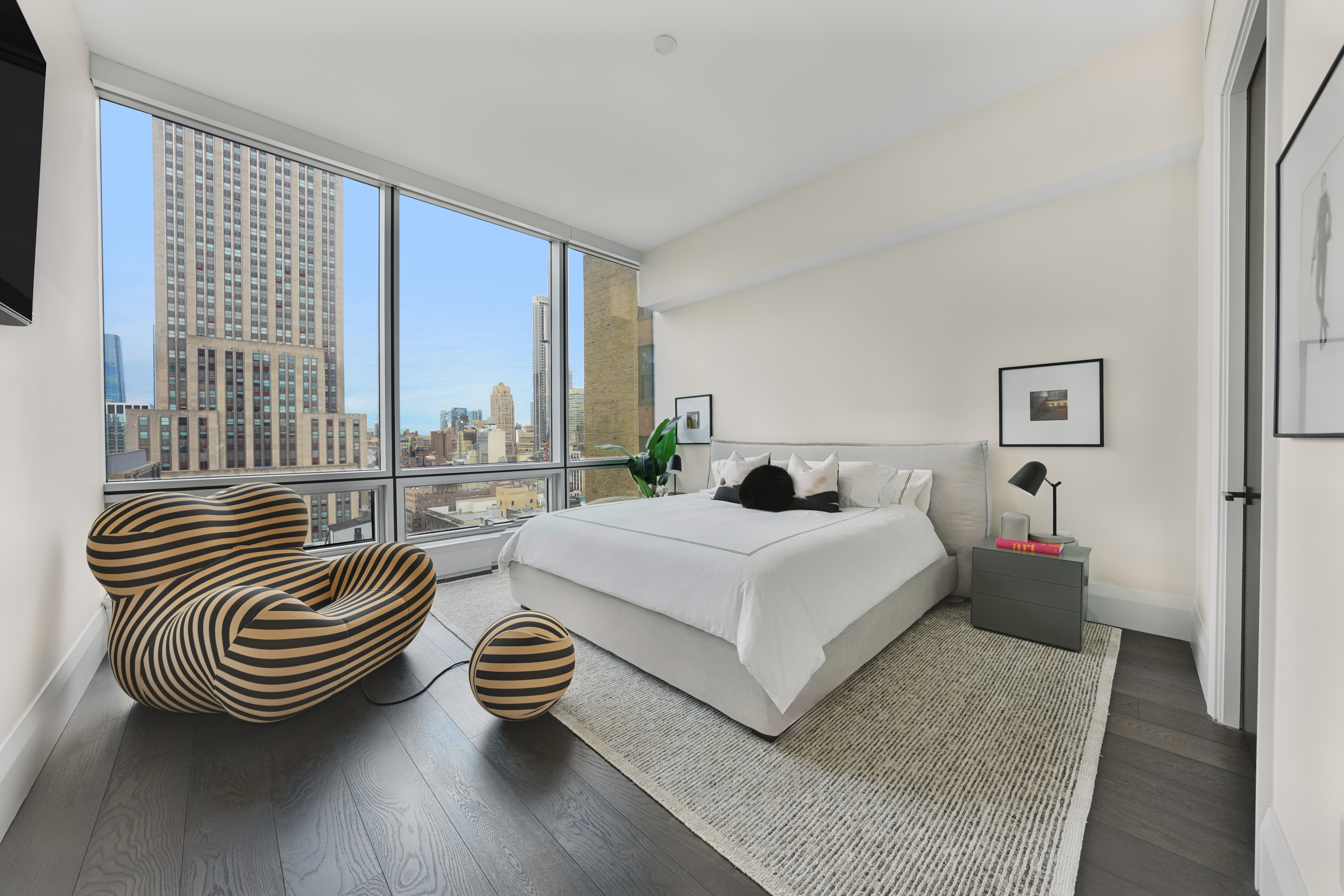 172 Madison Avenue, Unit 24B Manhattan, NY 10016 - Photo 6 of 16 a bedroom with furniture and a window