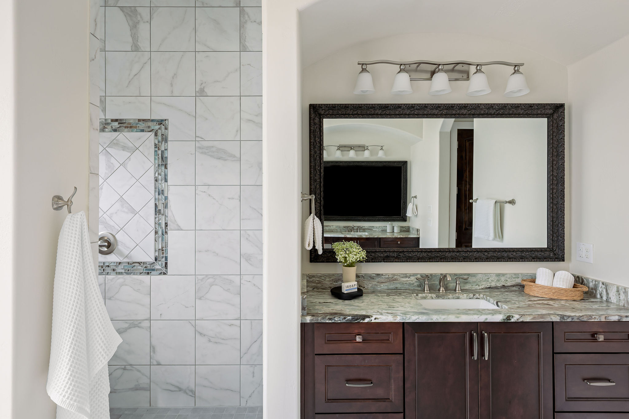 812 Jennings Branch Georgetown, TX 78633 - Photo 44 of 100 a bathroom with a granite countertop sink a mirror and shower