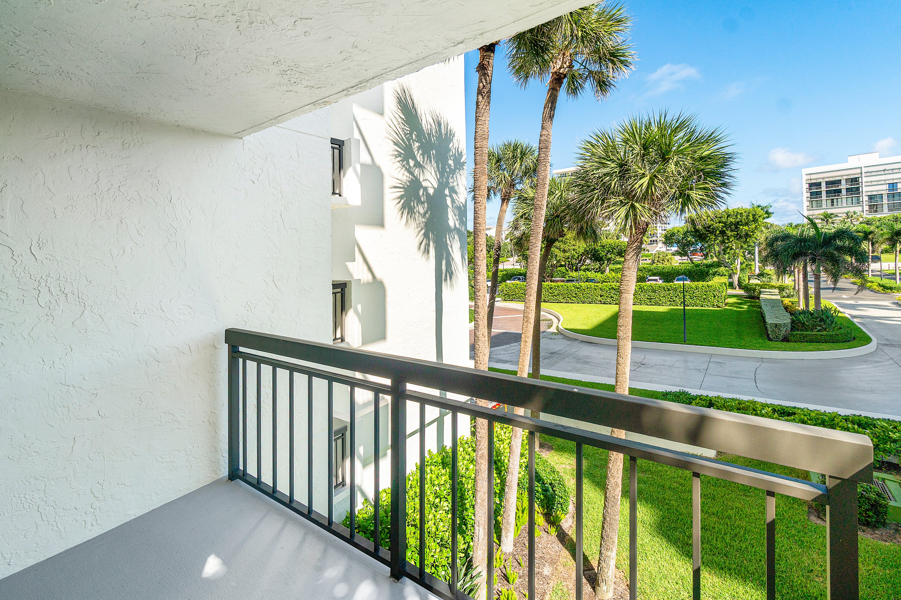 2003 North Ocean Boulevard, Unit 305 Boca Raton, FL 33431 - Photo 11 of 56 a view of balcony with small garden