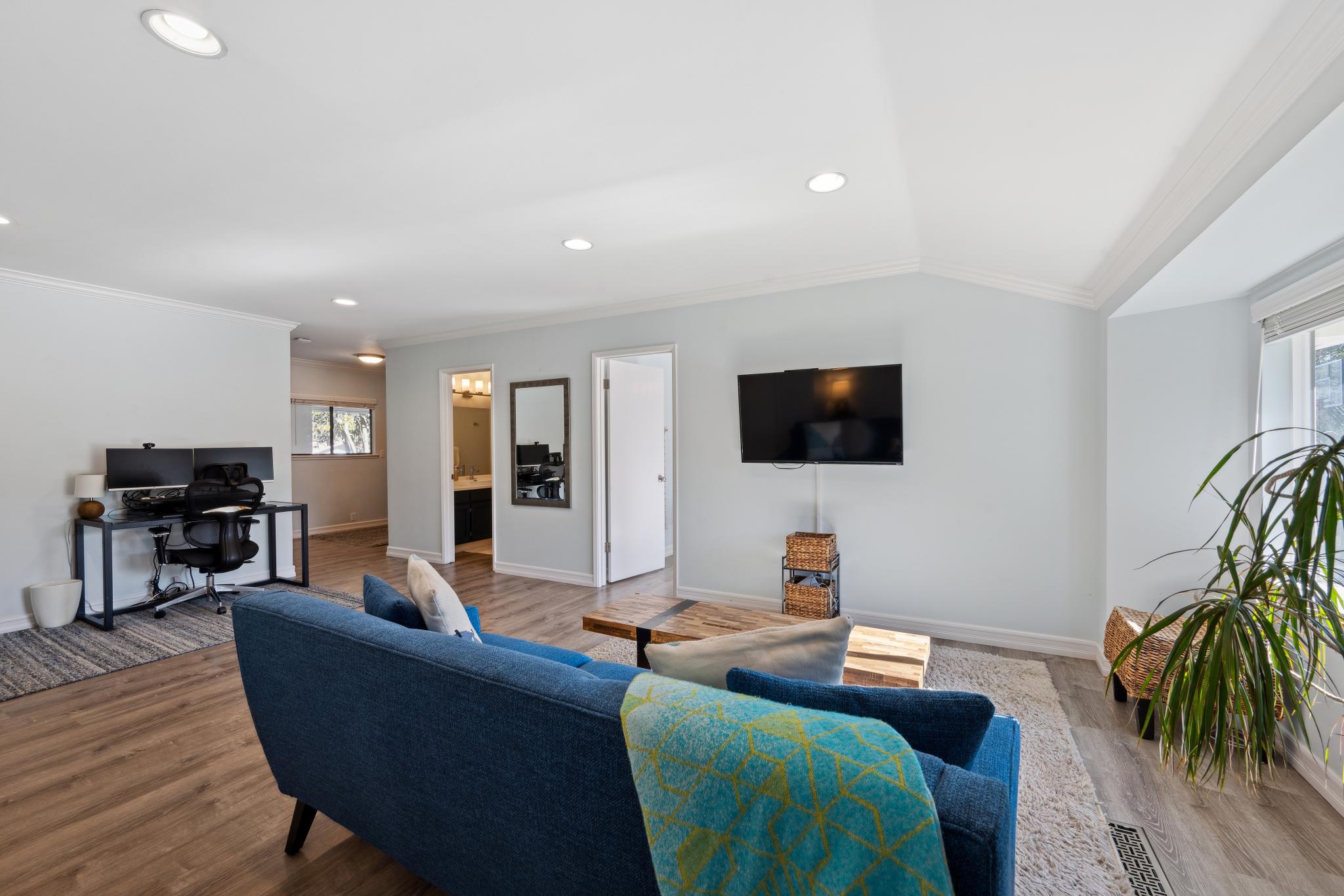 123 Frey Road Santa Rosa, CA 95409 - Photo 46 of 62 a living room with furniture and a flat screen tv