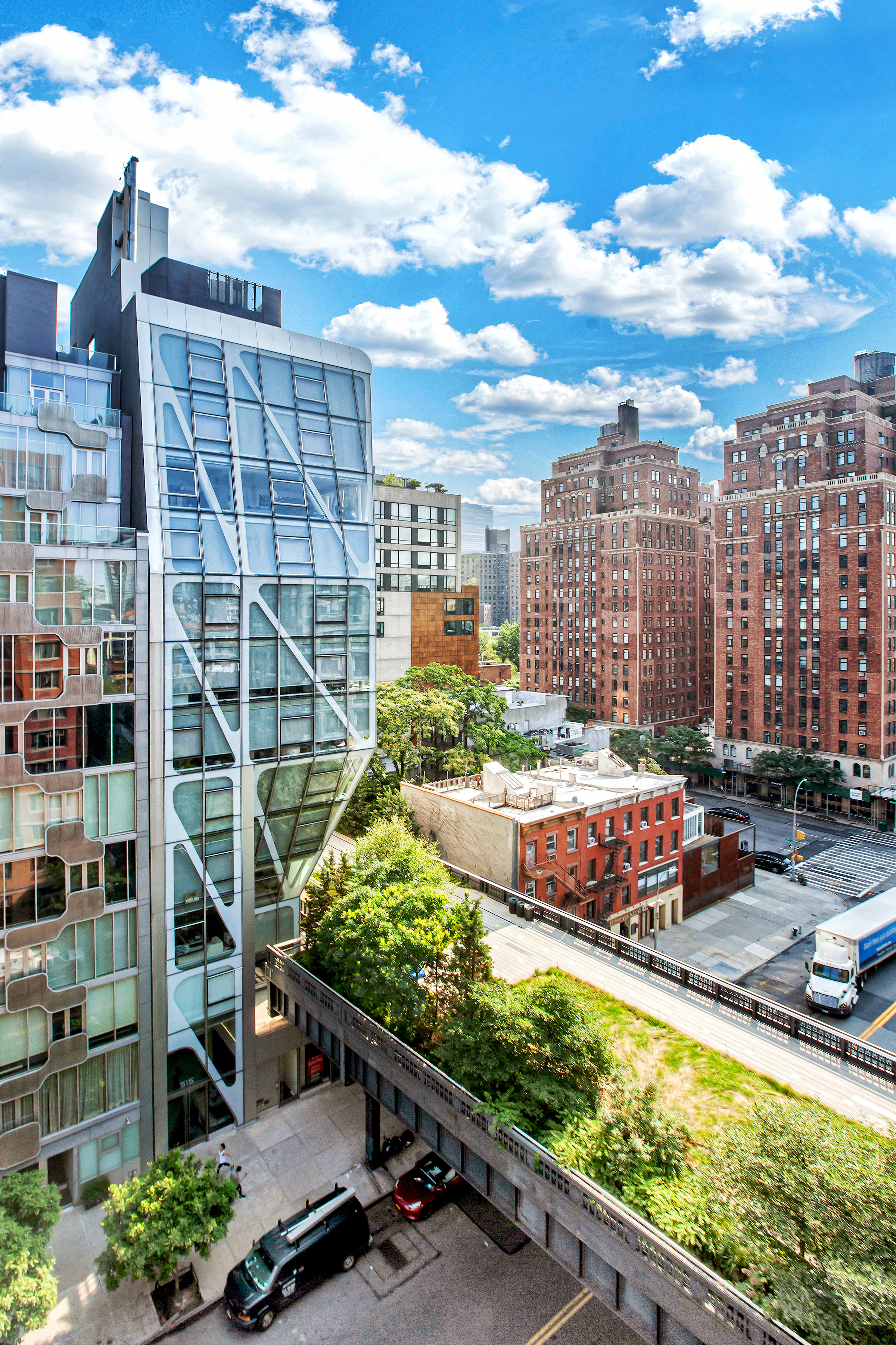 520 West 23rd Street, Unit 7E Manhattan, NY 10011 - Photo 2 of 9 a view of a city with tall buildings