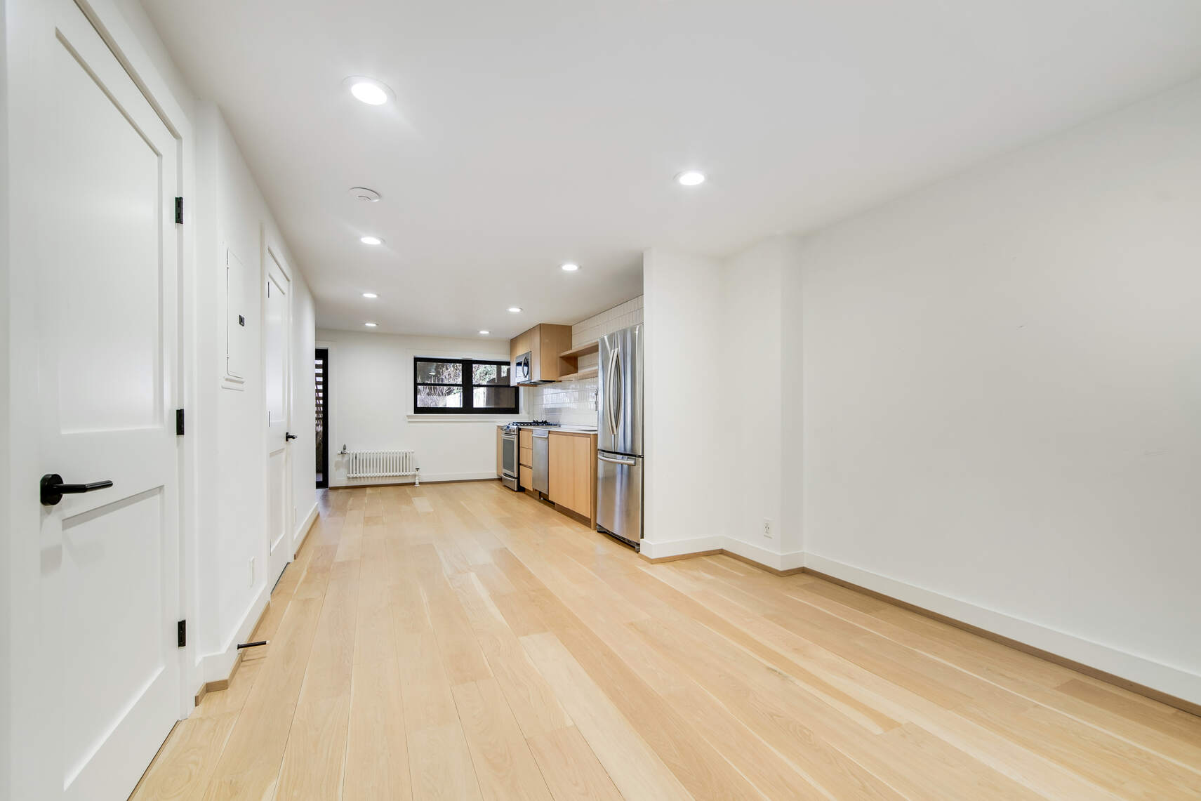 14 Hampton Place Brooklyn, NY 11213 - Photo 5 of 12 a view of a kitchen with refrigerator and windows