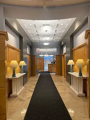404 East 76th Street, Unit 30C Manhattan, NY 10021 - Photo 23 of 24 a view of a living room and entryway