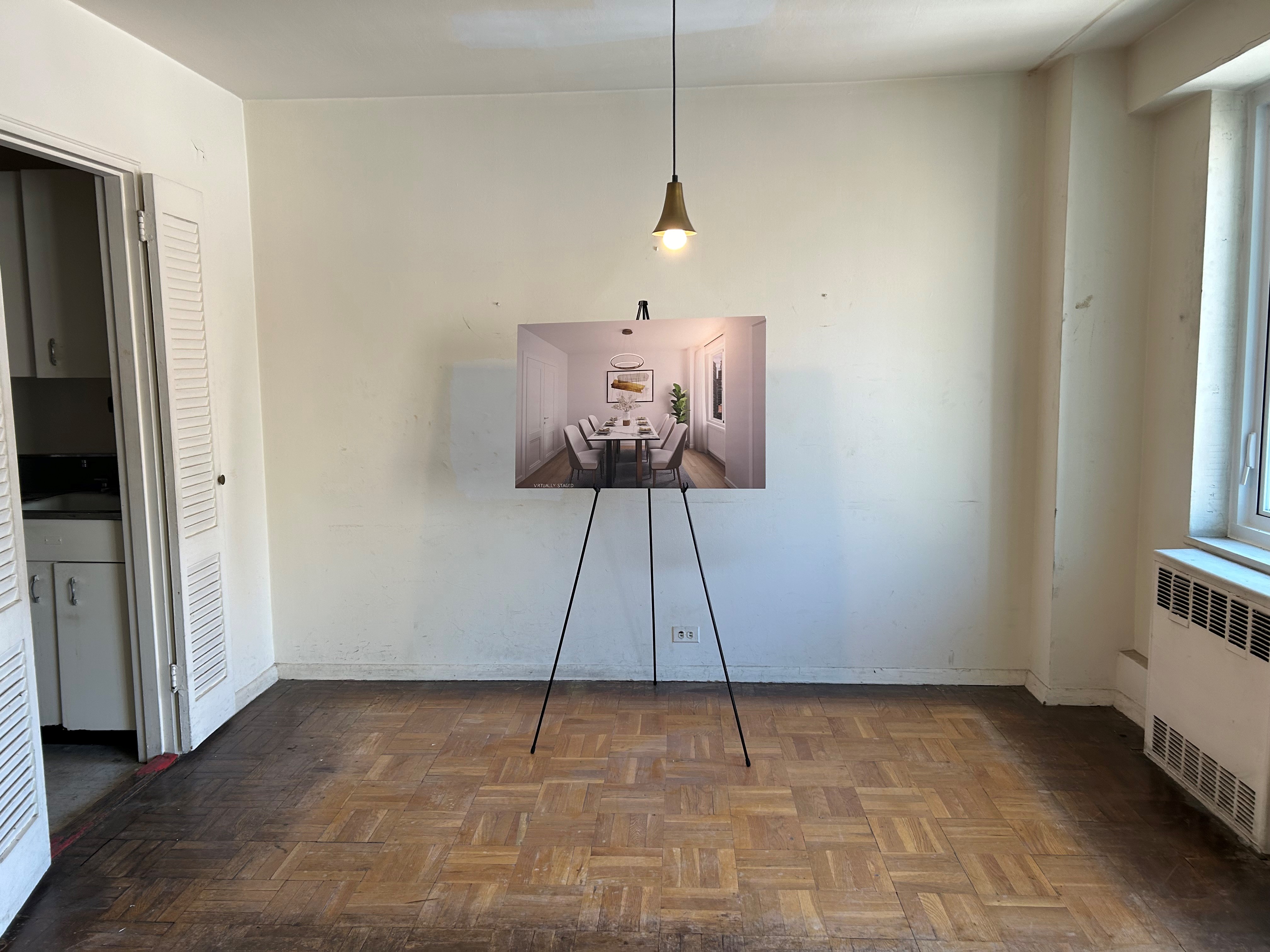 411 East 53rd Street, Unit 11K Manhattan, NY 10022 - Photo 4 of 19 a room with a window and chandelier