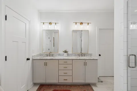 a bathroom with a bathtub and a sink