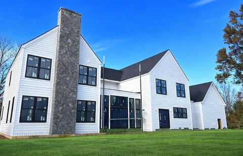 a view of a back yard of the house