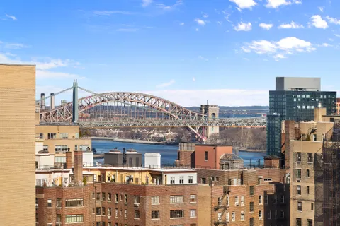 a view of a city with tall buildings