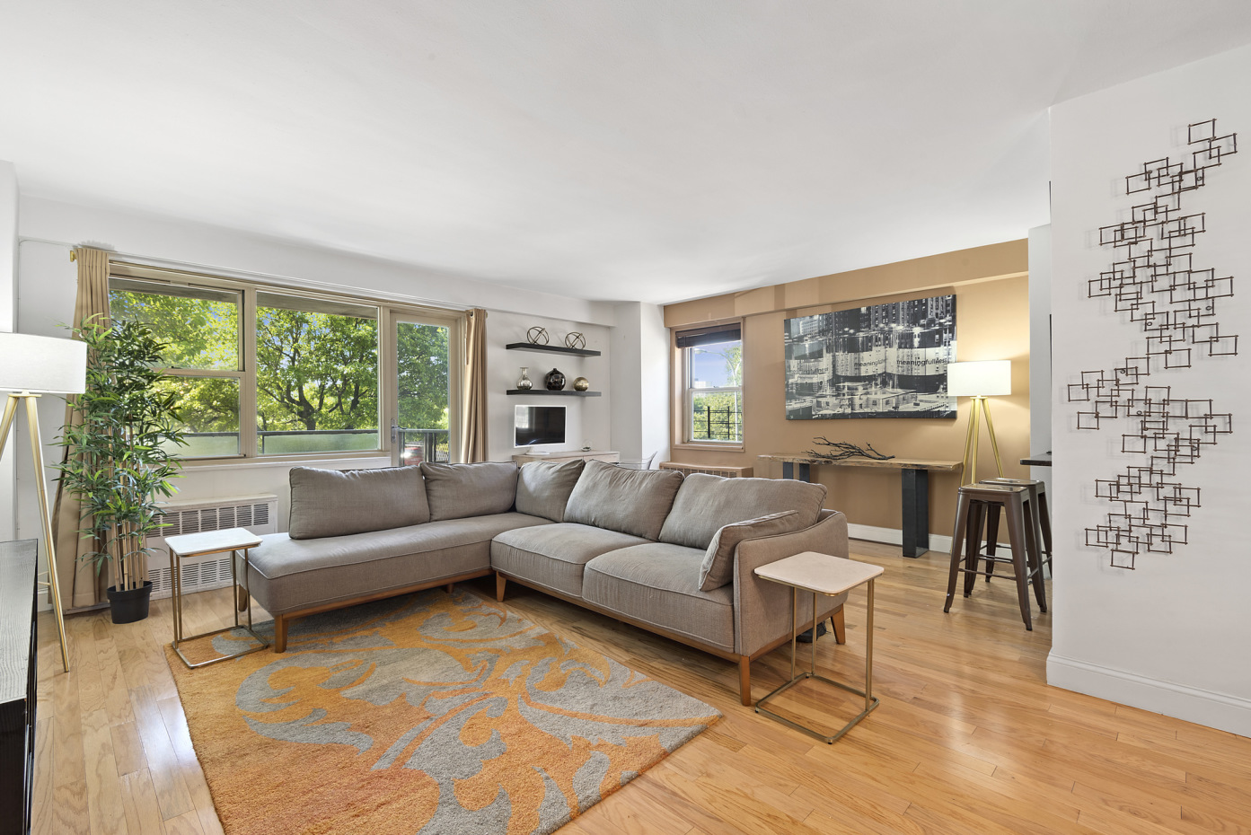Brooklyn, NY 11207 - Photo 1 of 6 a living room with furniture and a large window