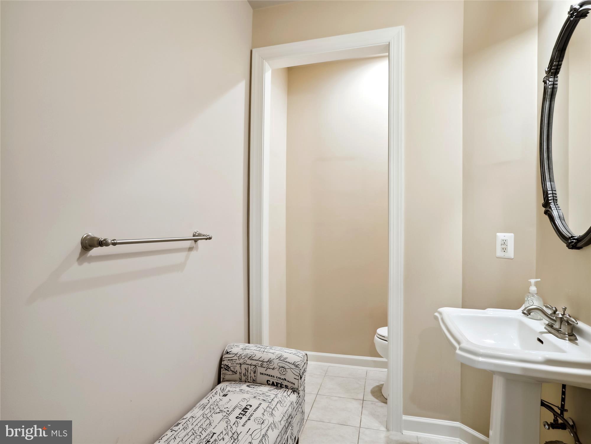 14302 Derby Ridge Road Bowie, MD 20721 - Photo 32 of 67 a bathroom with a sink and a mirror