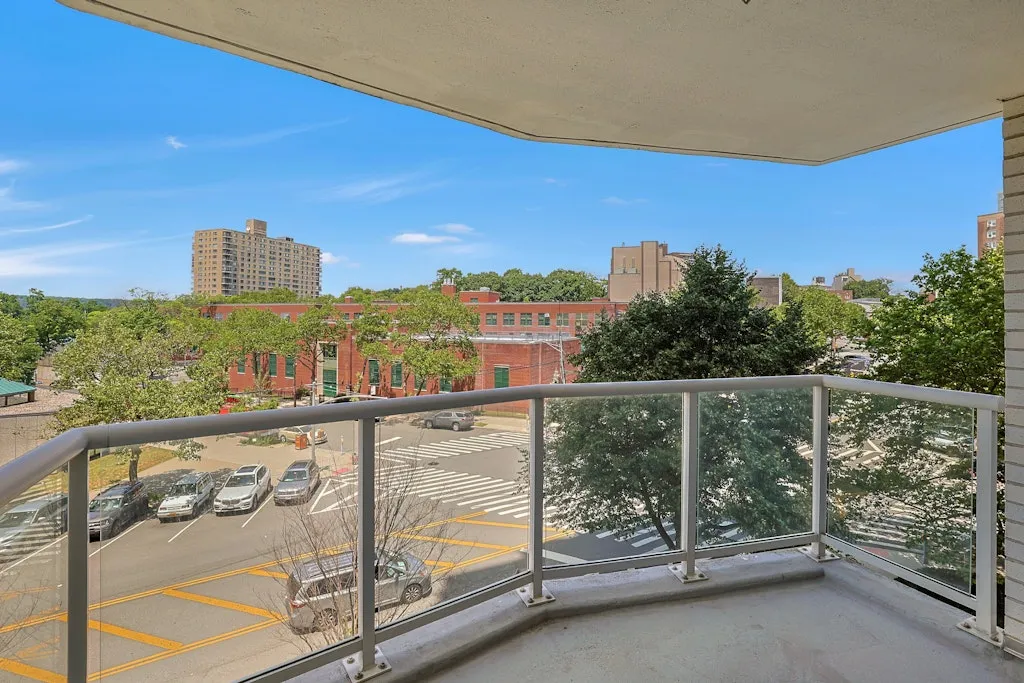 a view of a balcony with city view