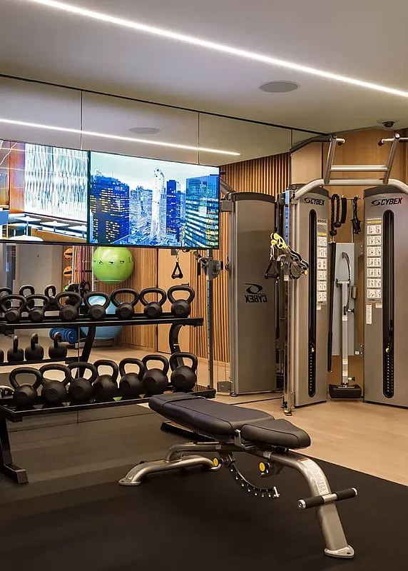 100 East 53rd Street, Unit 40A Manhattan, NY 10022 - Photo 17 of 20 a view of a room with gym equipment