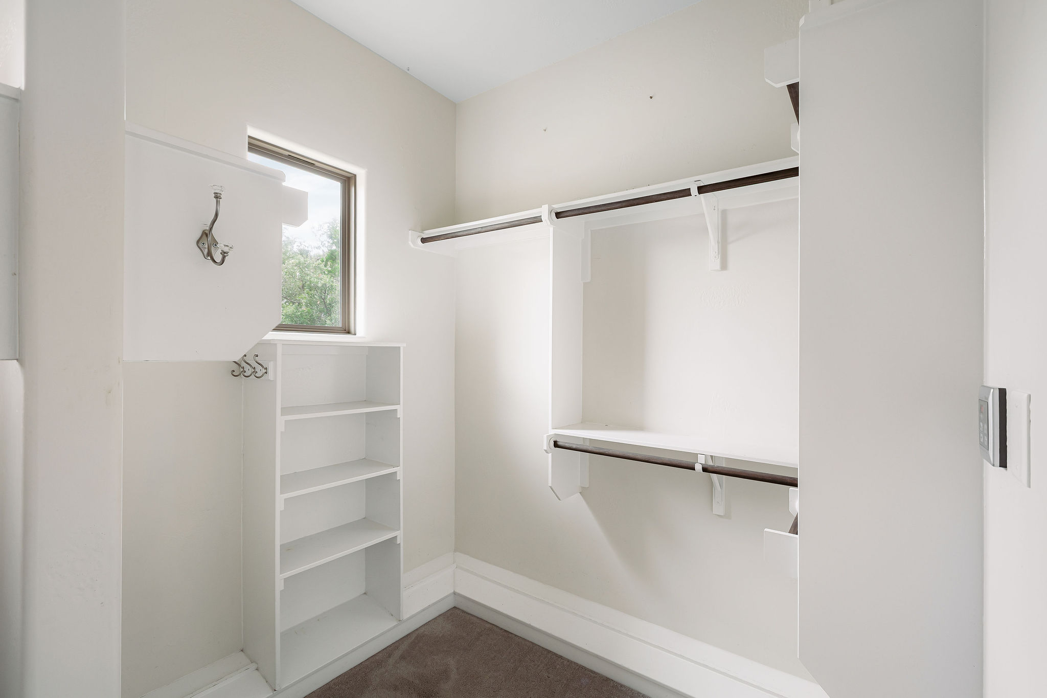 812 Jennings Branch Georgetown, TX 78633 - Photo 47 of 100 a view of walk in closet with empty racks