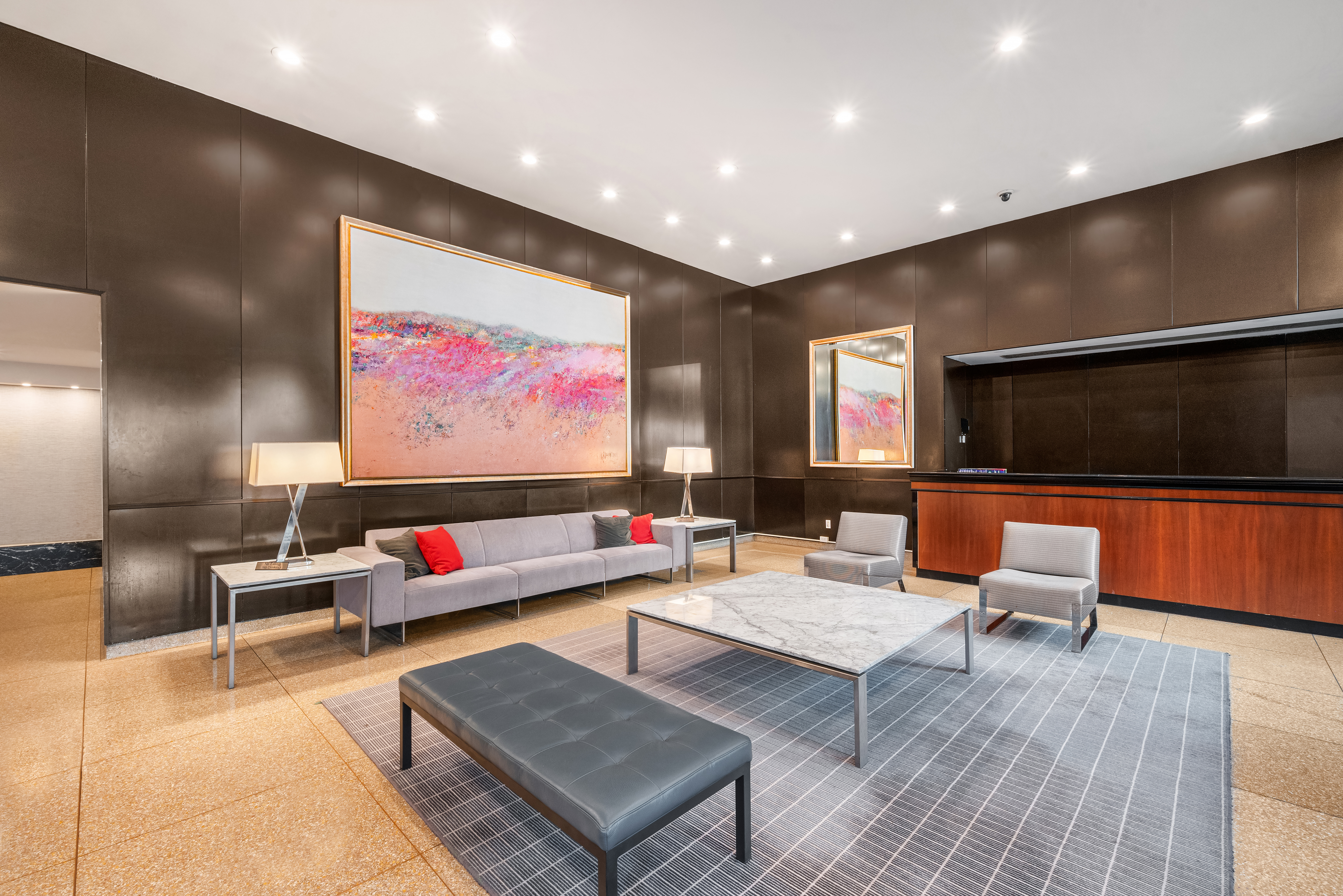 444 East 86th Street, Unit 4D Manhattan, NY 10028 - Photo 9 of 12 a living room with furniture and a flat screen tv