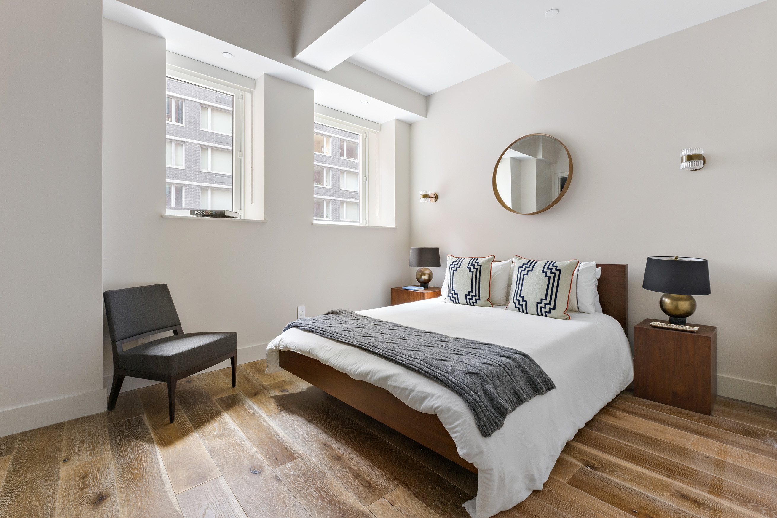 93 Worth Street, Unit 311 Manhattan, NY 10013 - Photo 15 of 17 a bedroom with bed and a window