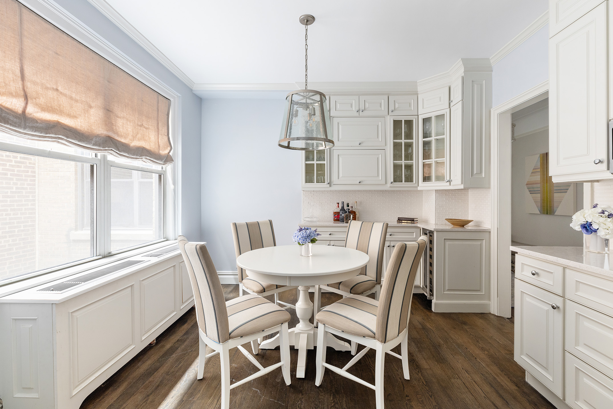 174 West 76th Street, Unit 4GH Manhattan, NY 10023 - Photo 6 of 16 a dining room with wooden floor and breakfast area