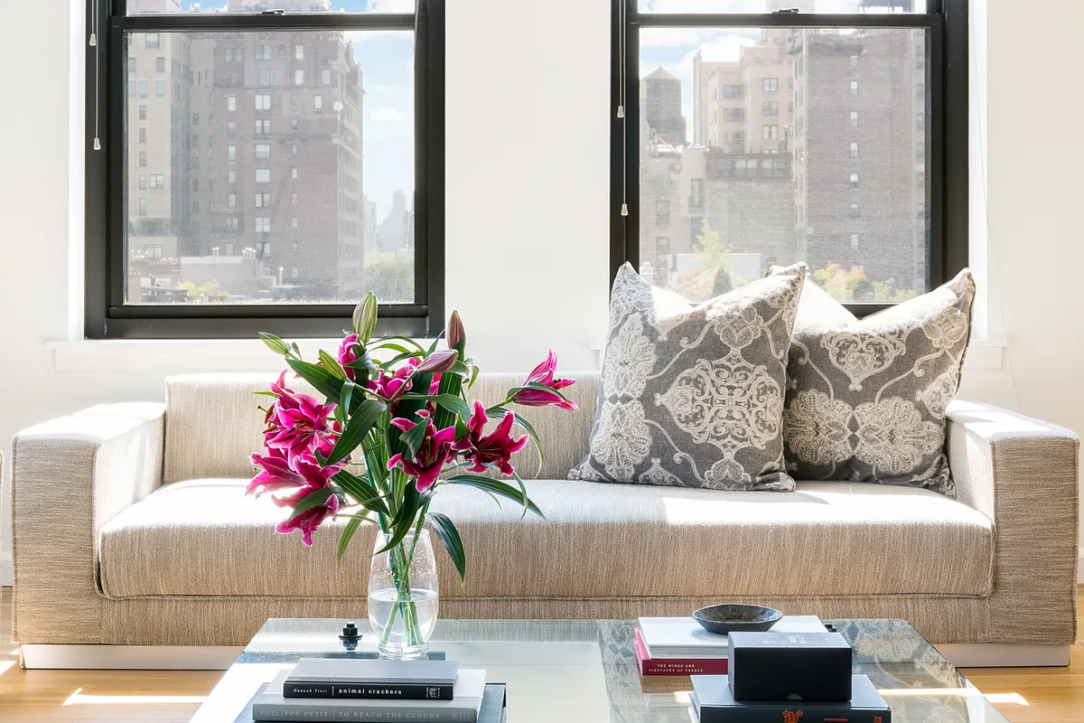 104 West 70th Street, Unit 7G Manhattan, NY 10023 - Photo 5 of 8 a vase of flowers sitting on a table