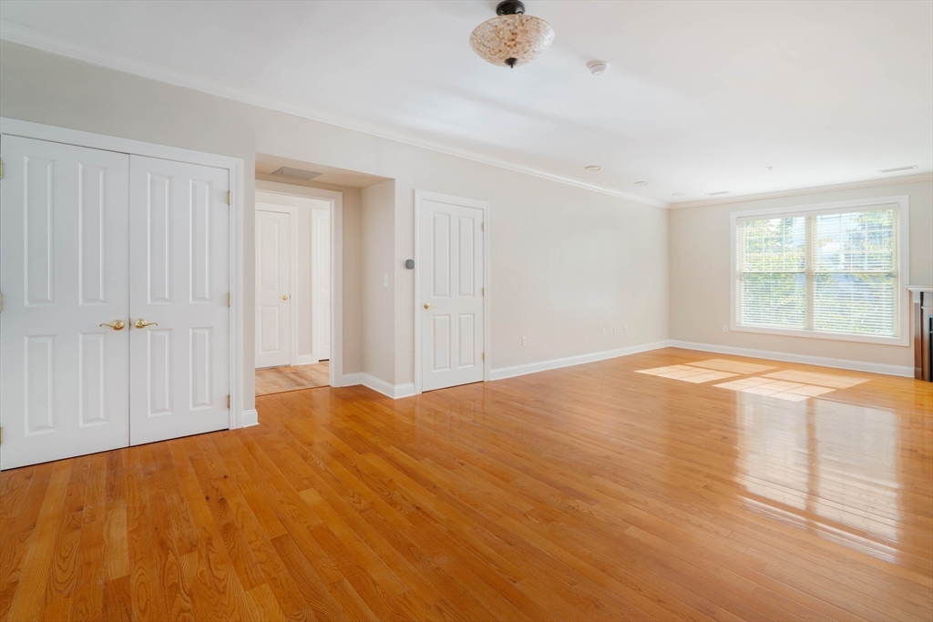 248 Albion Street, Unit 321 Wakefield, MA 01880 - Photo 6 of 21 an empty room with a window