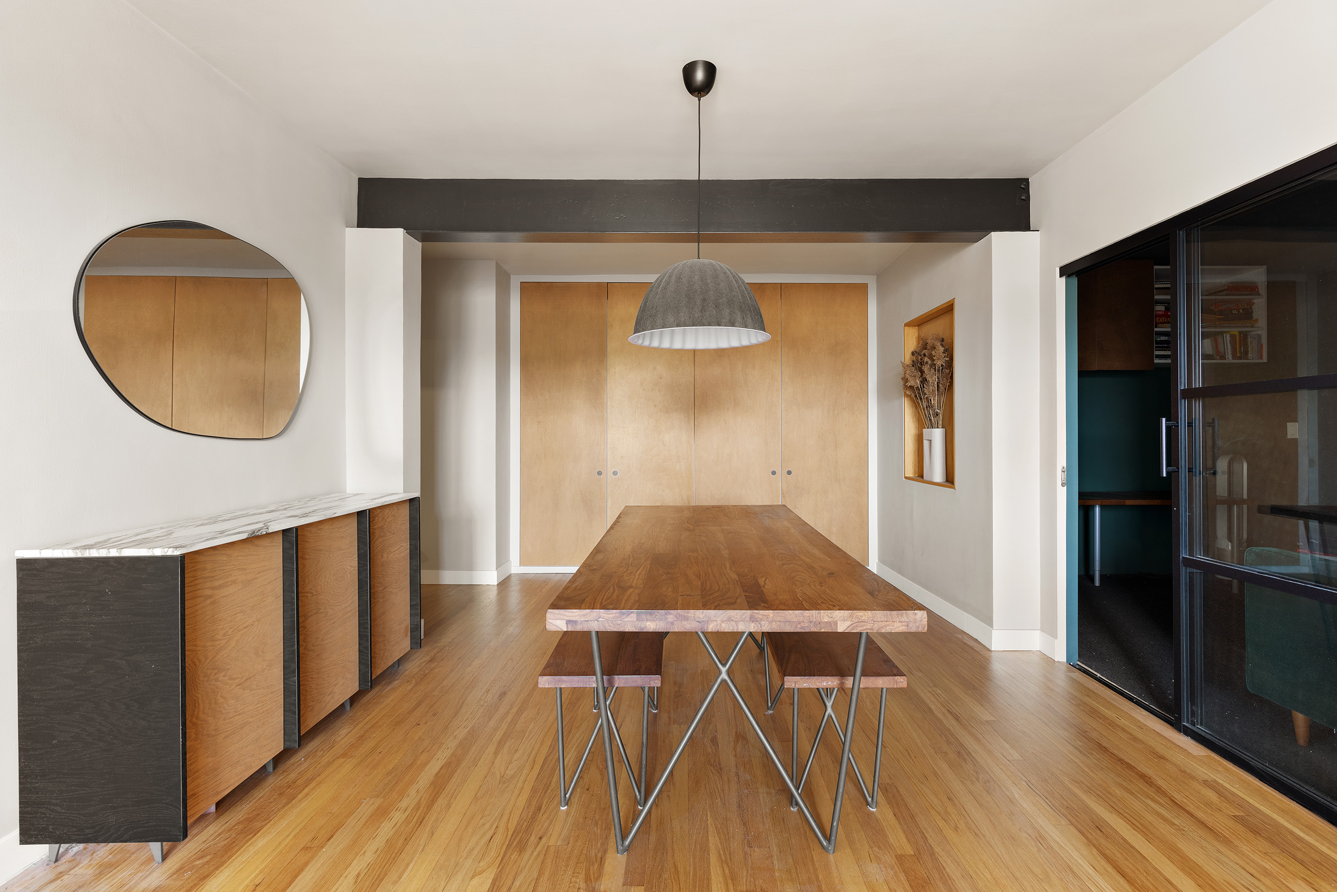 100 Ocean Parkway, Unit 4H Brooklyn, NY 11218 - Photo 2 of 11 a hallway with wooden floor potted plant and a stove top oven